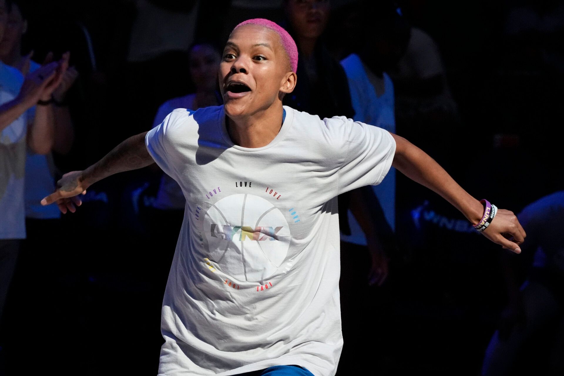 Minnesota Lynx guard Courtney Williams (10) leaps during introductions before the game with the Los Angeles Sparks at Target Center.