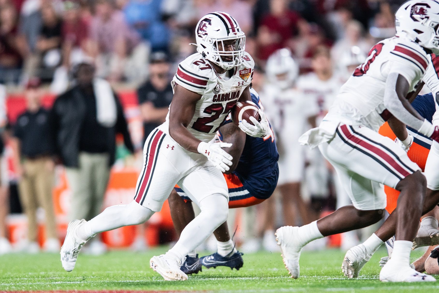 South Carolina Gamecocks running back Oscar Adaway III (27) runs the ball against the Illinois Fighting Illini in the. fourth quarter at Camping World Stadium.