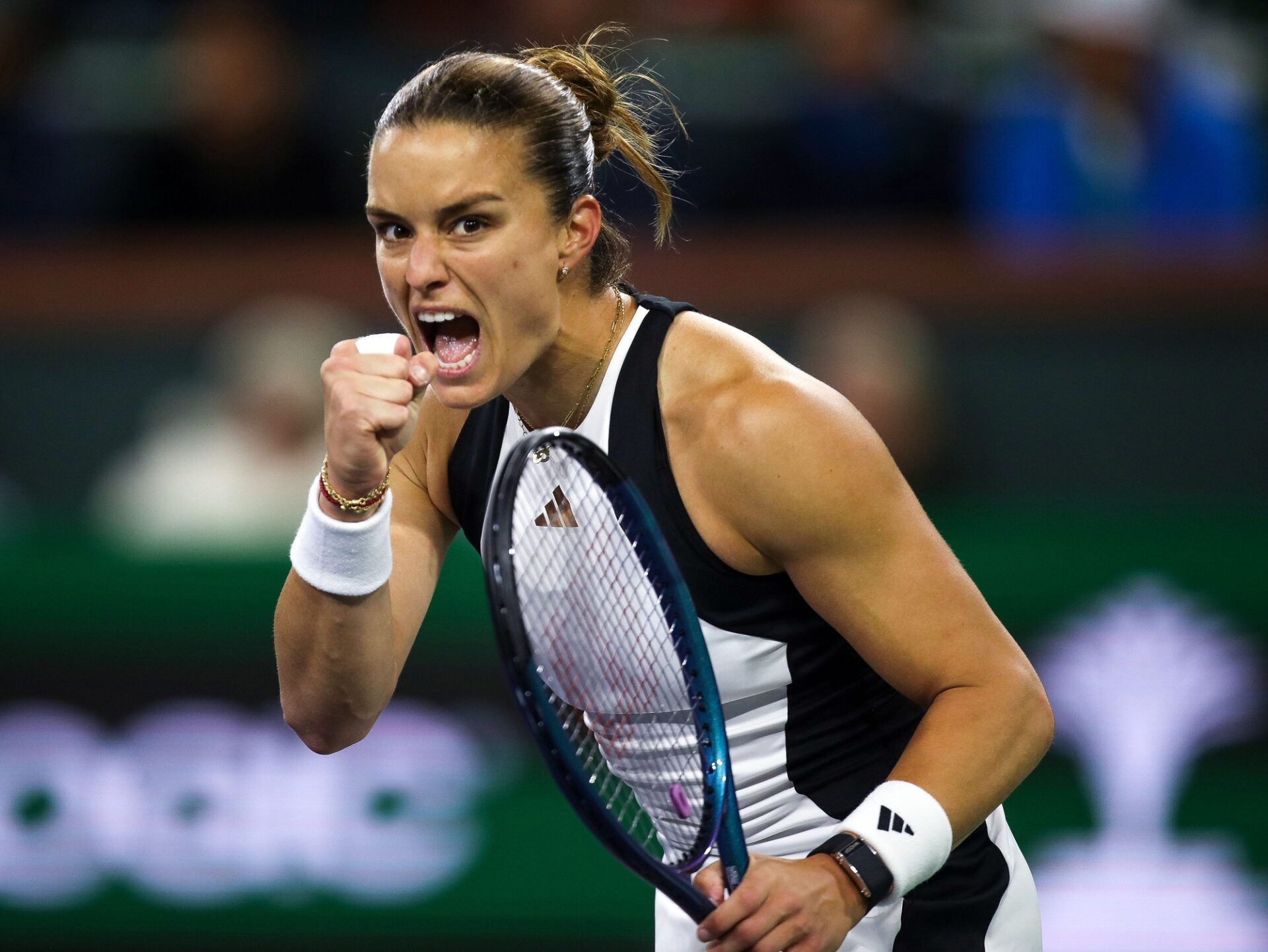 Maria Sakkari celebrates a game win toward the end of her semifinal win against Coco Gauff at the BNP Paribas Open in Indian Wells, Calif., March15, 2024.