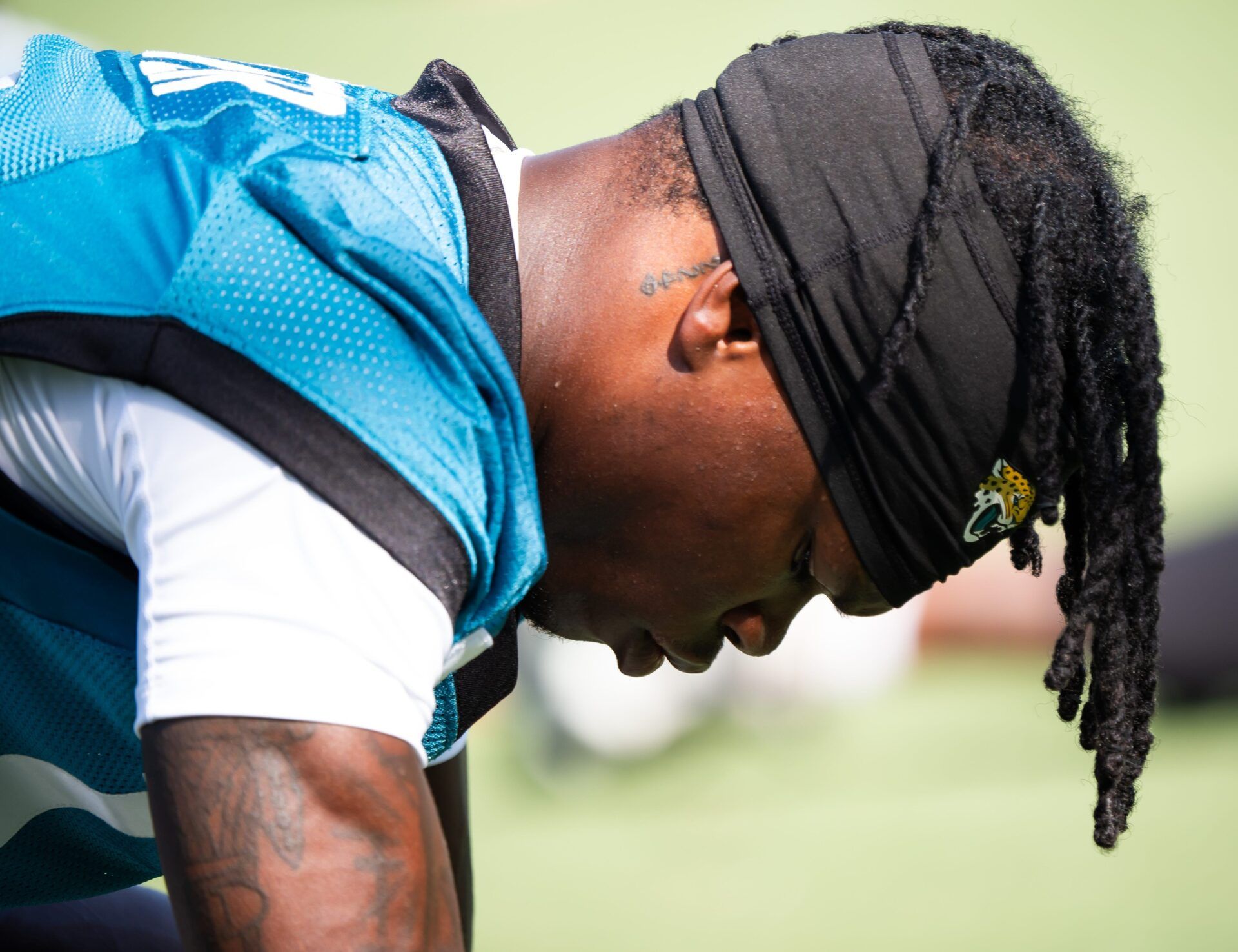 Jacksonville Jaguars wide receiver Travis Hunter (12) stretches during the Jacksonville Jaguars’ third mandatory minicamp Thursday June 12, 2025 at the Miller Electric Center in Jacksonville, Fla. [Doug Engle/Florida Times-Union]