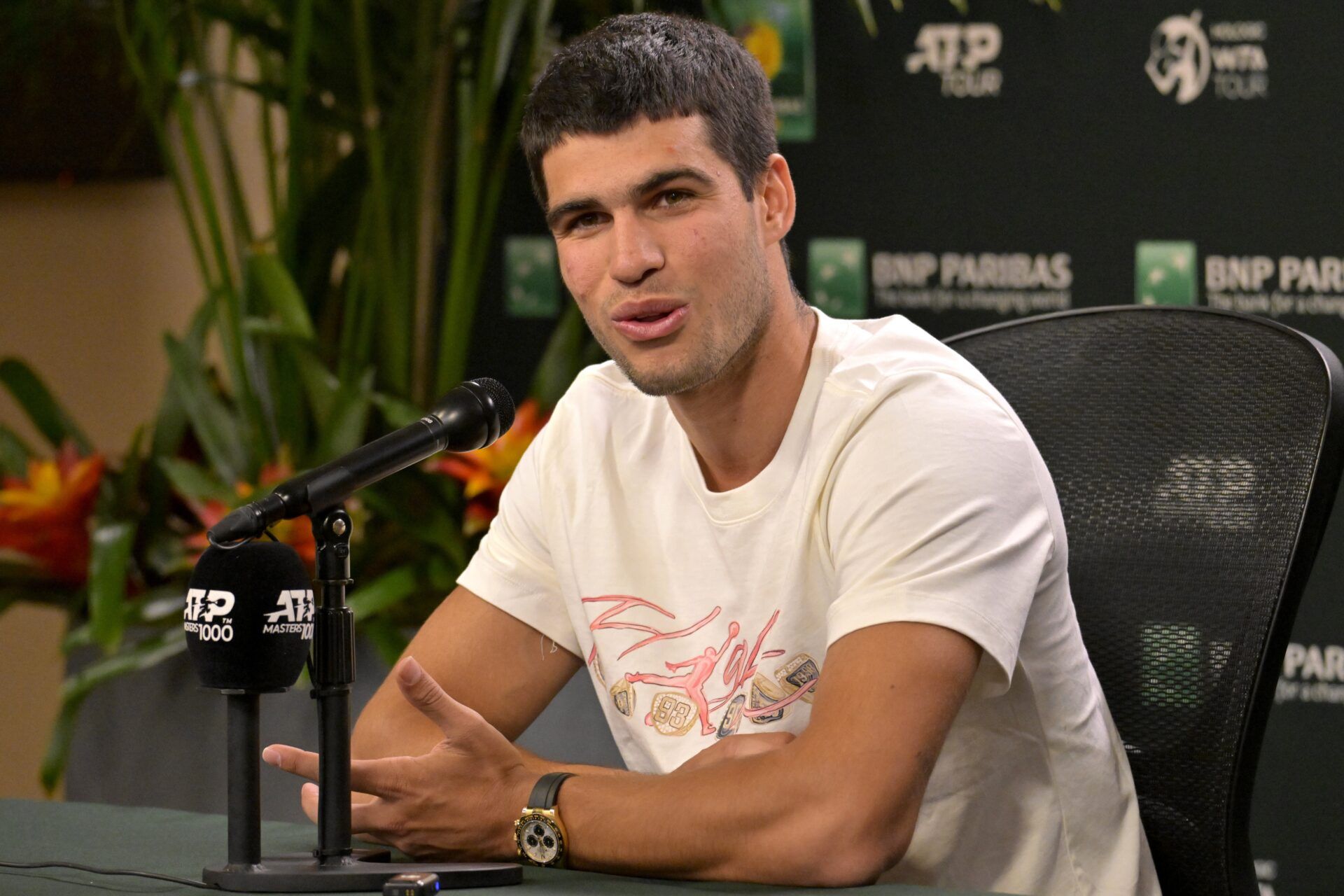 Carlos Alcaraz (ESP) answers questions from the media during a press conference during the BNP Paribas Open at the Indian Wells Tennis Garden.