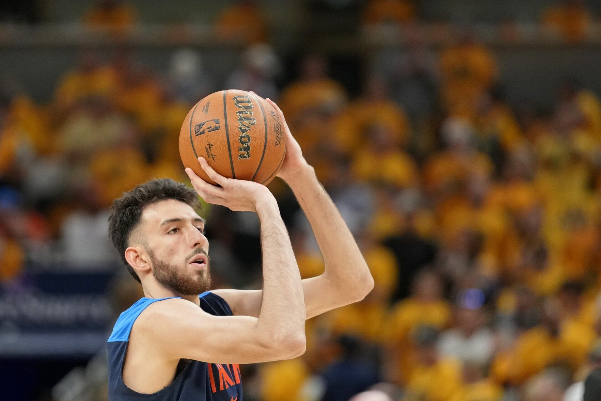 Oklahoma City Thunder forward Chet Holmgren (7) warms up before game six of the 2025 NBA Finals between the Oklahoma City Thunder and the Indiana Pacers at Gainbridge Fieldhouse.