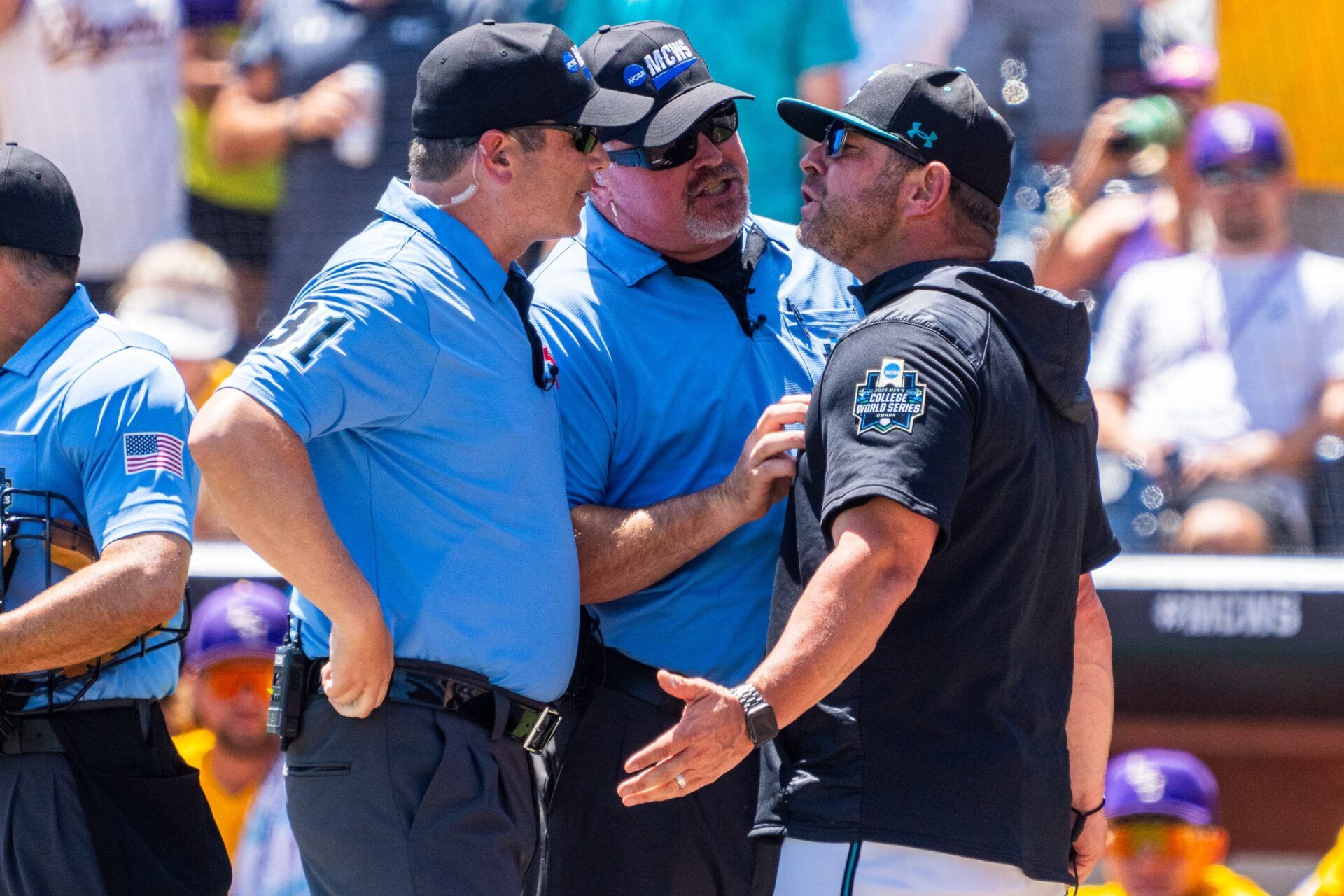 Coastal Carolina Chanticleers head coach Kevin Schnall reacts after being ejected during the first inning against the LSU Tigers at Charles Schwab Field.