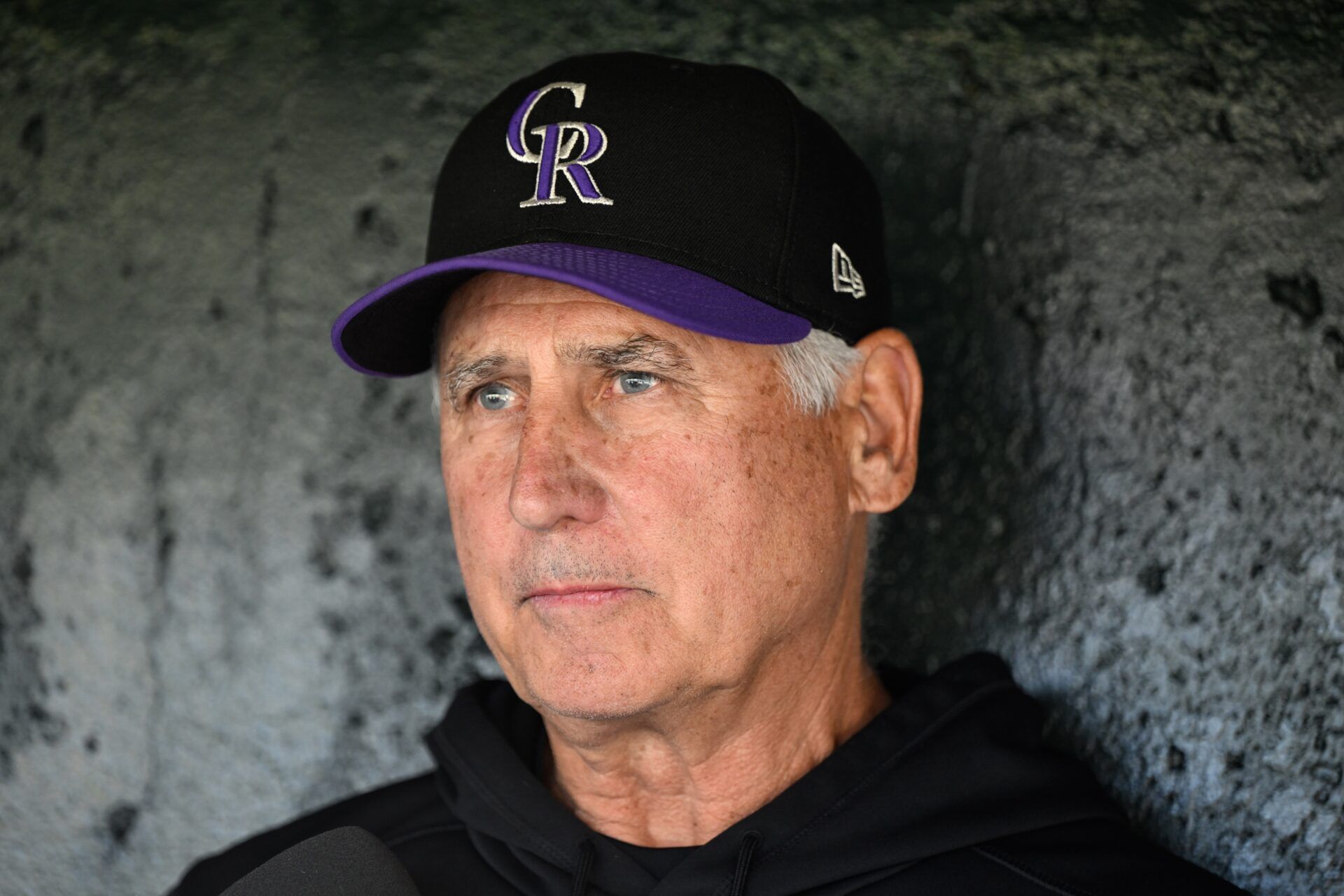 Colorado Rockies manager Bud Black sits in the dugout before their game against the San Francisco Giants at Oracle Park.