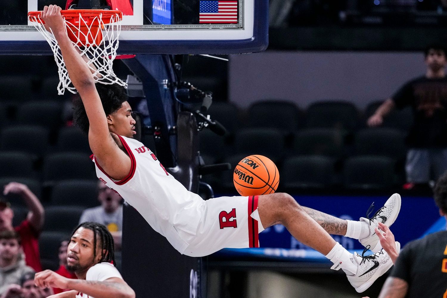 Rutgers Scarlet Knights guard Dylan Harper (2) dunks the ball Wednesday, March 12, 2025, in a first round game at the 2025 TIAA Big Ten Men’s Basketball Tournament between the USC Trojans and the Rutgers Scarlet Knights at Gainbridge Fieldhouse in Indianapolis. The USC Trojans defeated the Rutgers Scarlet Knights, 97-89.