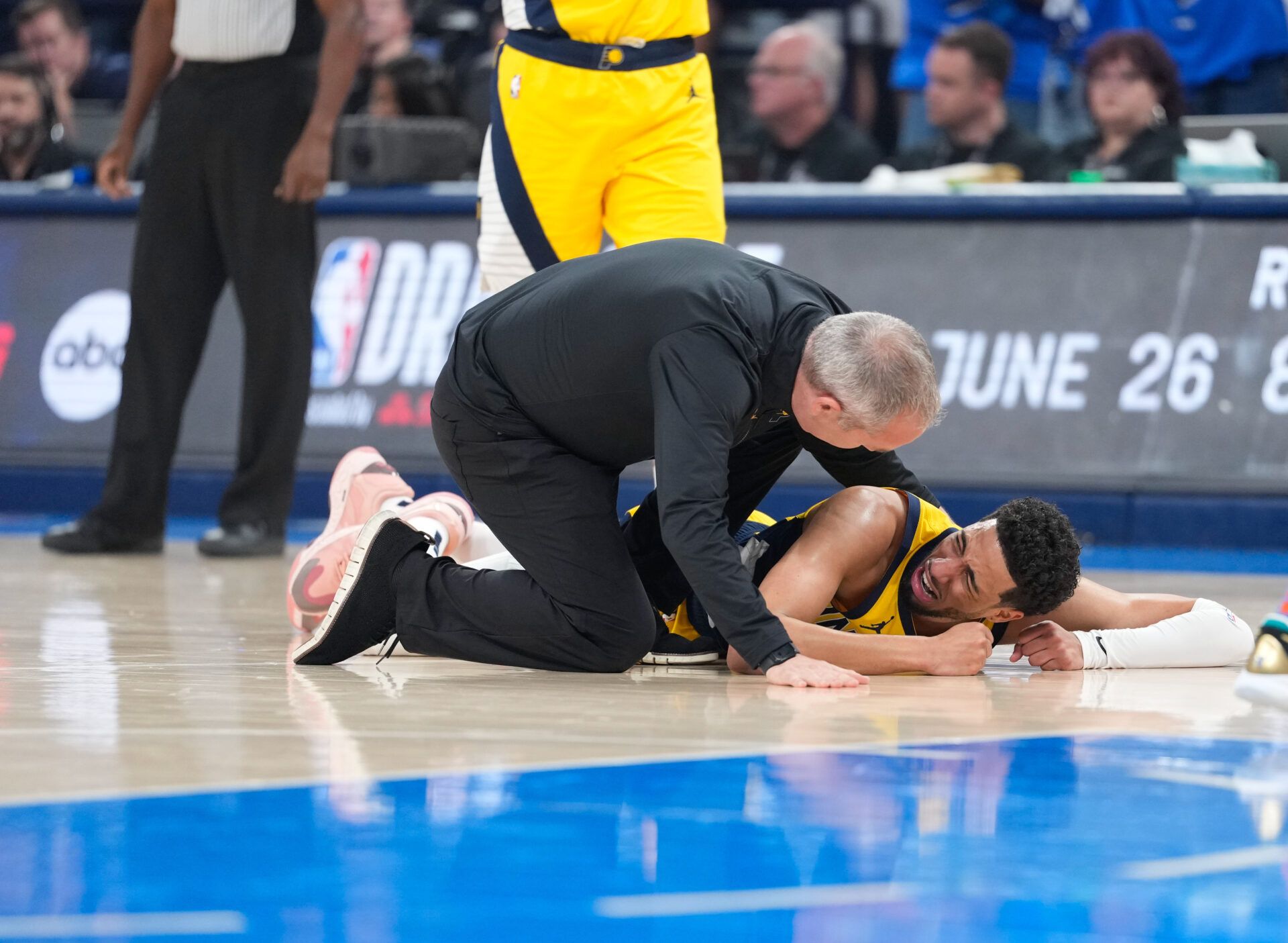 Indiana Pacers guard Tyrese Haliburton (0) reacts after suffering an injury during the first quarter against the Oklahoma City Thunder during game seven of the 2025 NBA Finals at Paycom Center.