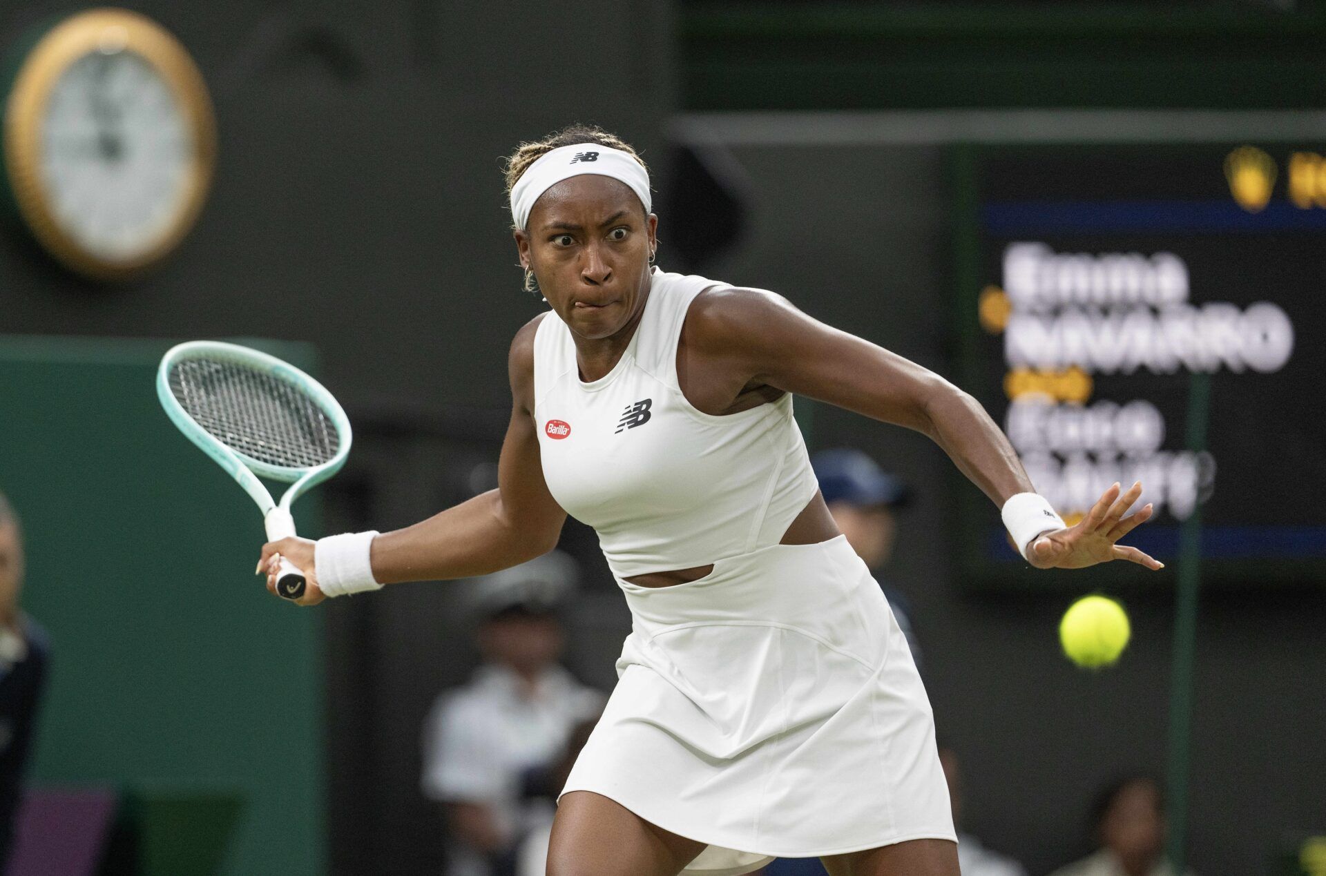Coco Gauff of the United States returns a shot during her match against Emma Navarro of the United States (not shown) on day seven of The Championships at All England Lawn Tennis and Croquet Club.