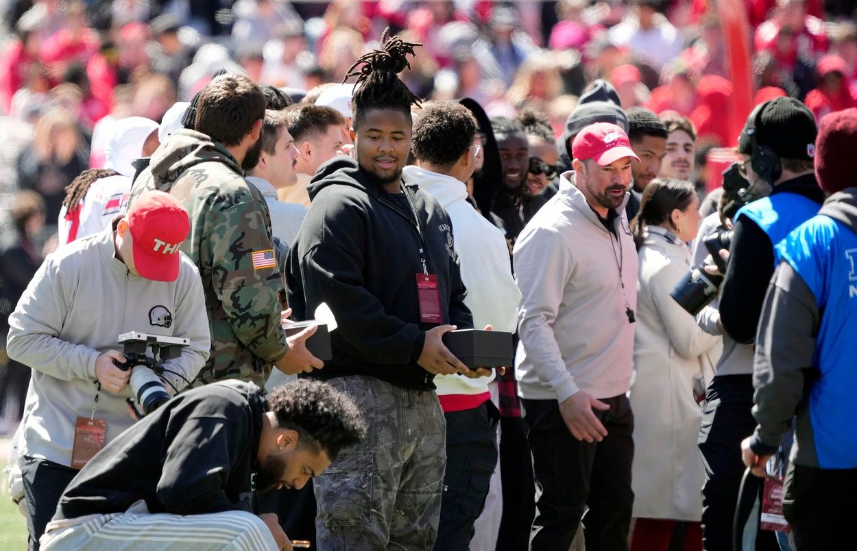 Former Ohio State Buckeye players received a box of three rings for winning the College Football Playoffs during the spring game at Ohio Stadium on April 12, 2025. Players and coaches from the 2024 championship team received a ring for making the College Football Playoff, one from the CFP for winning it and a championship ring from Ohio State.