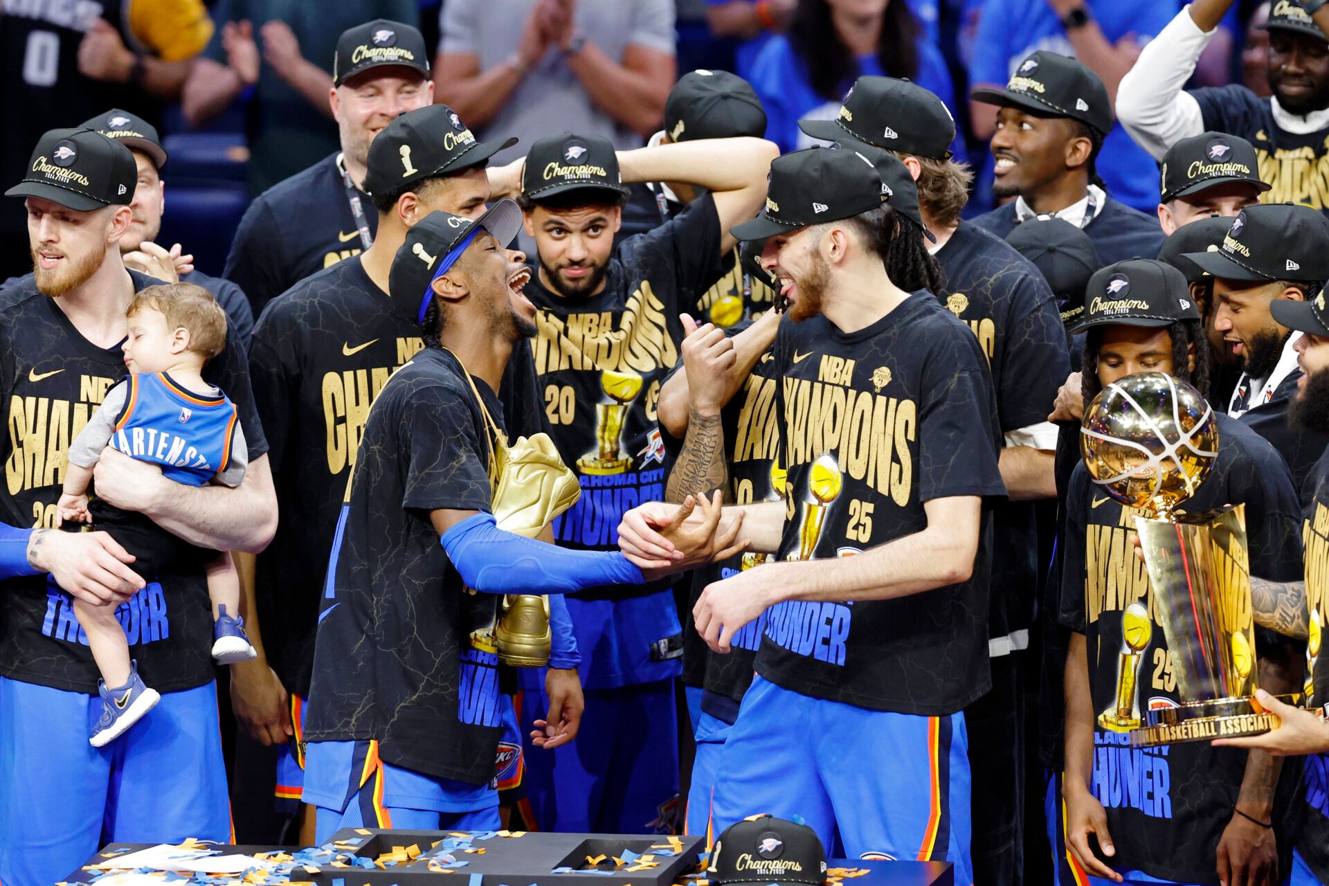 Oklahoma City Thunder guard Shai Gilgeous-Alexander (2) celebrates with Oklahoma City Thunder forward Chet Holmgren (7) after winning game seven of the 2025 NBA Finals against the Indiana Pacers at Paycom Center.