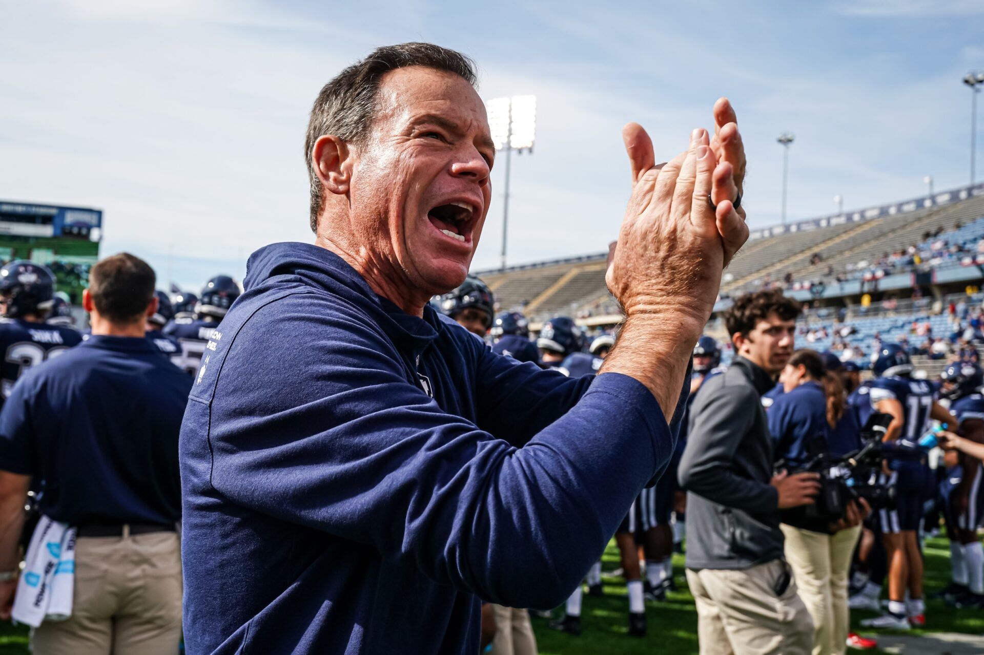 UConn Huskies head coach Jim Mora reacts to the crowd before the start of the game against the FIU Golden Panthers at Rentschler Field at Pratt & Whitney Stadium.