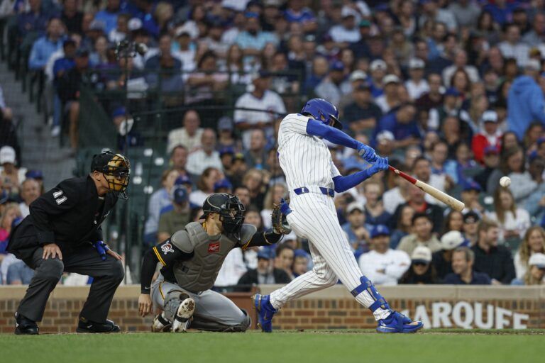 Chicago Cubs right fielder Kyle Tucker (30) singles against the Pittsburgh Pirates during the fourth inning at Wrigley Field.