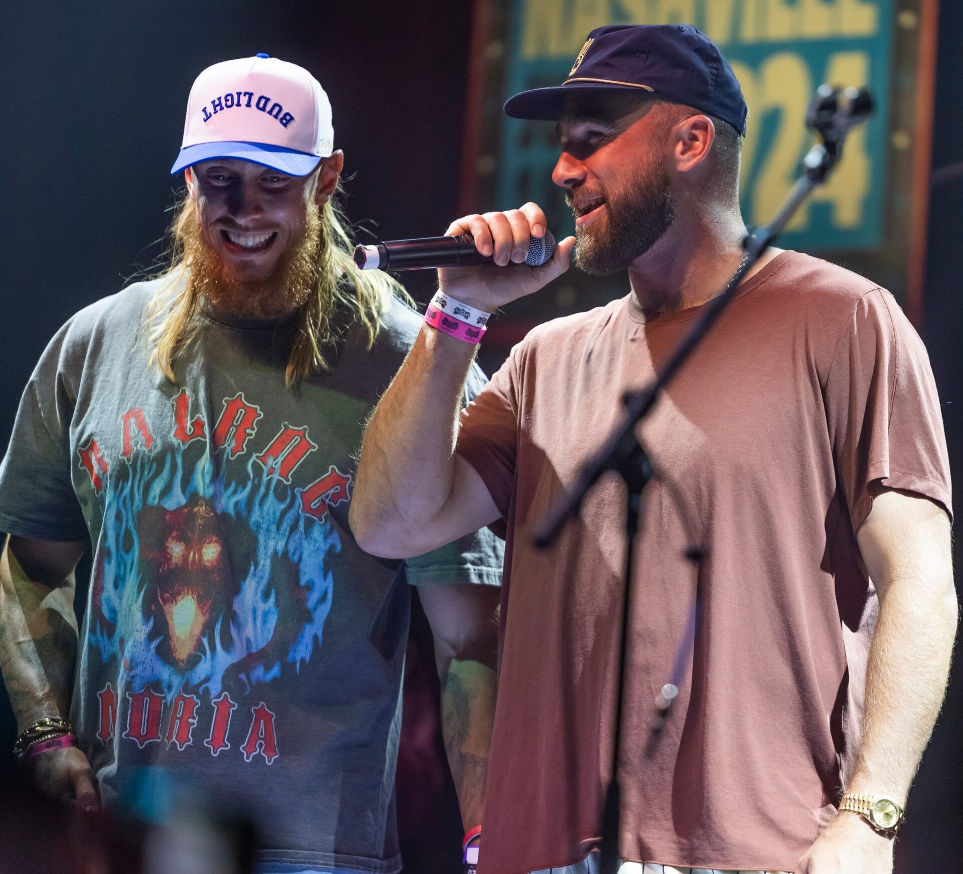George Kittle and Travis Kelce greet the crowd during the “Tight Ends & Friends” concert at Brooklyn Bowl Tuesday, June 18, 2024 in Nashville, Tenn.