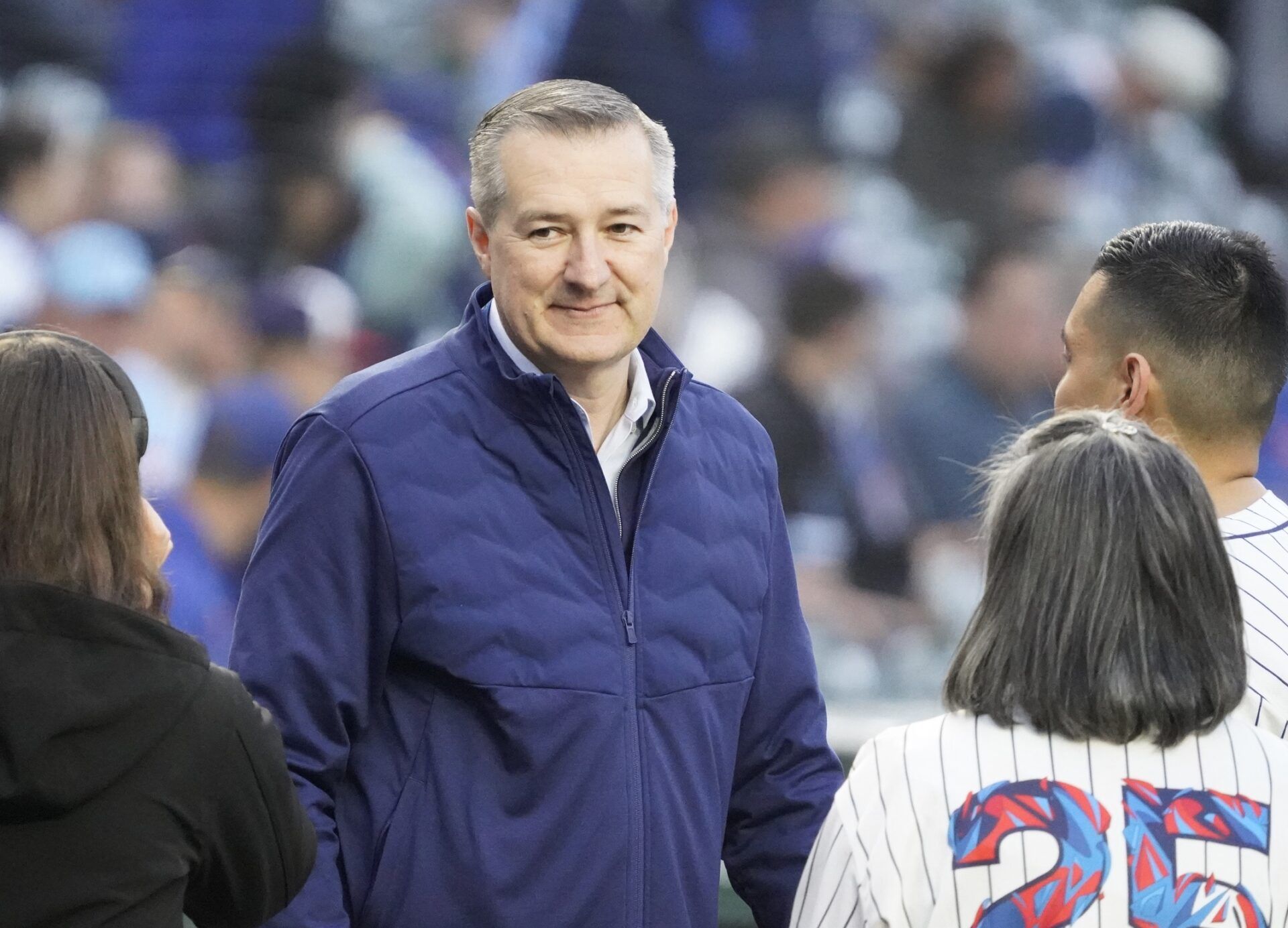 Chicago Cubs chairman Tom Ricketts on the field before the game between the Chicago Cubs and the Colorado Rockies at Wrigley Field.