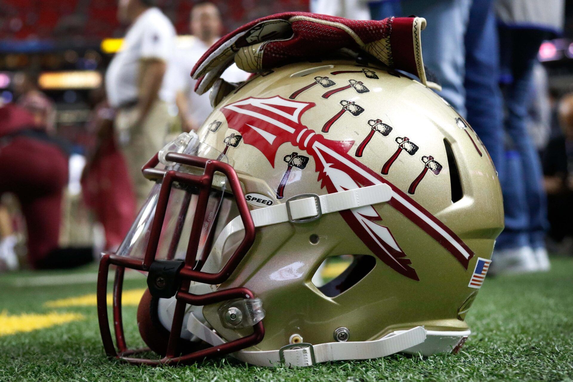 Detailed view of Florida State Seminoles helmet on the sidelines before a game against the Houston Cougars in the 2015 Chick-fil-A Peach Bowl at the Georgia Dome.