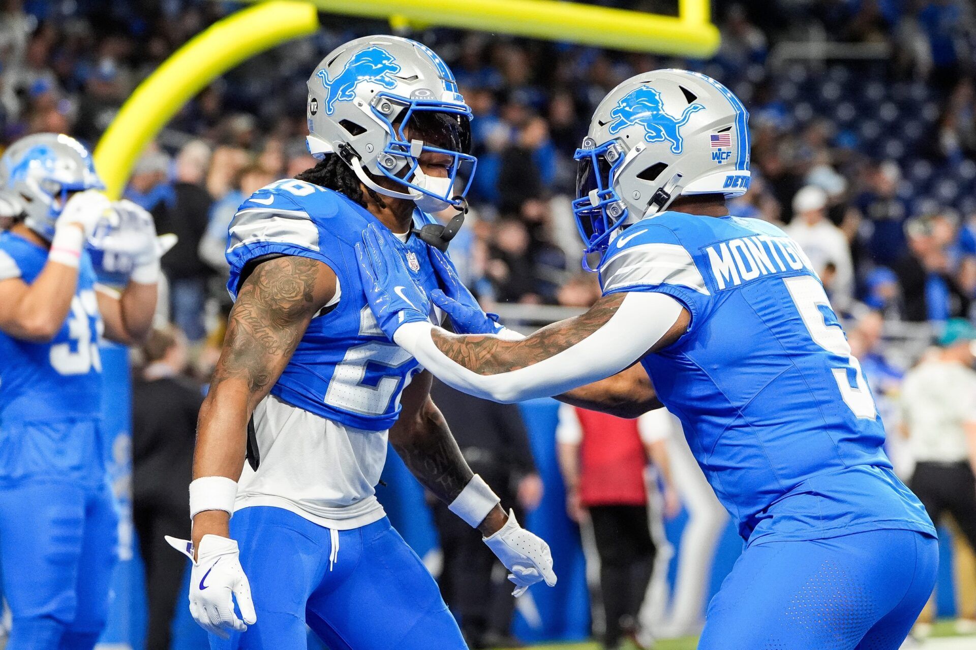 Detroit Lions running back Jahmyr Gibbs (26) warms up with running back David Montgomery (5) before the game between Detroit Lions and Jacksonville Jaguars at Ford Field in Detroit on Sunday, Nov. 17, 2024.