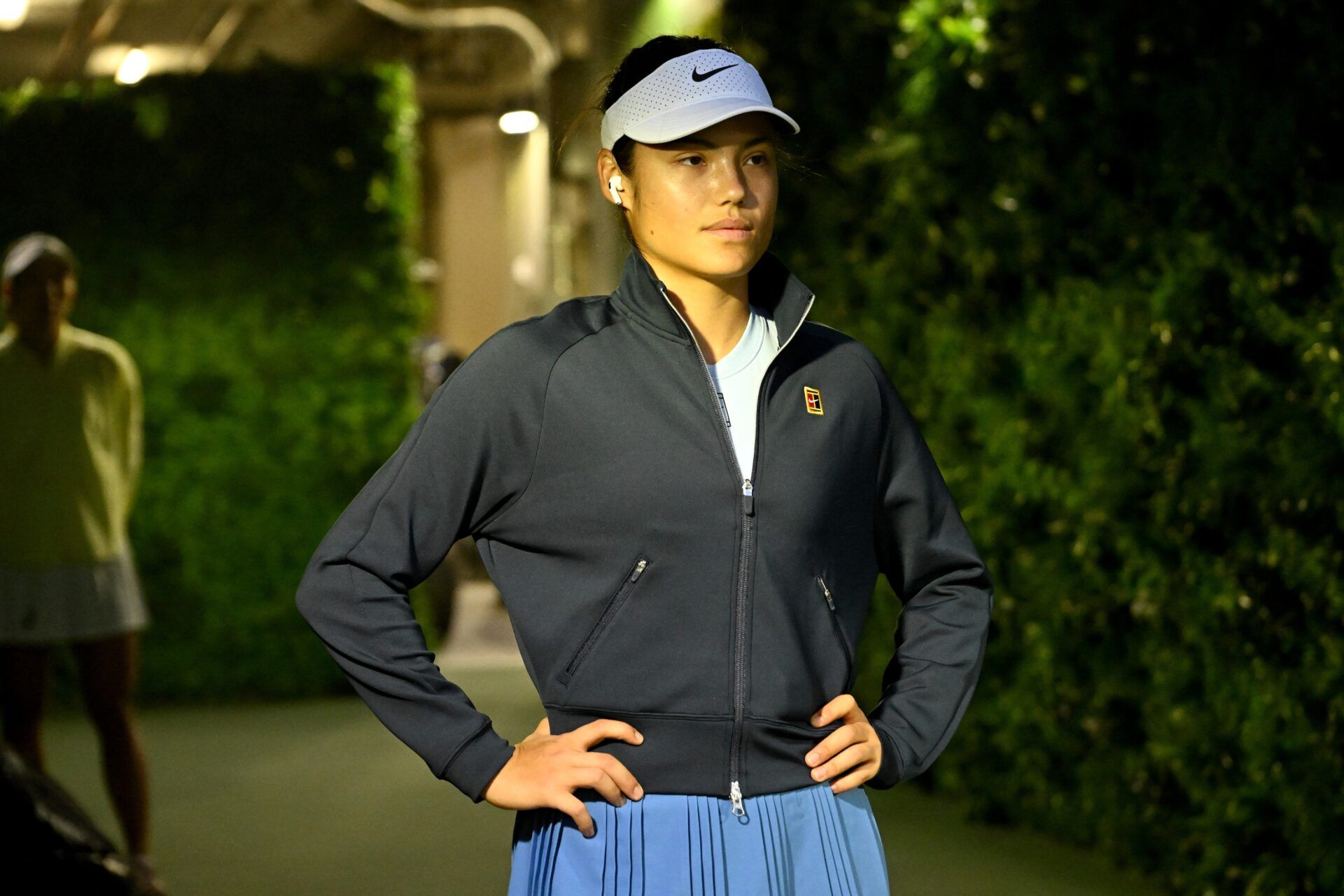 Emma Raducanu  (GBR) waits to enter the court for her first round match against Moyuka Uchijima (not pictured) in the BNP Paribas Open at the Indian Well Tennis Garden.