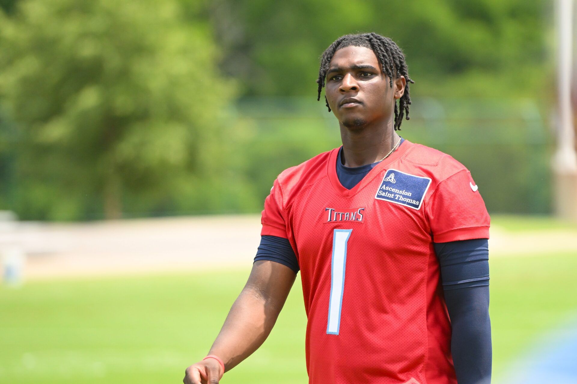 Tennessee Titans quarterback Cam Ward (1) walks off the field during minicamp at Nissan Stadium.