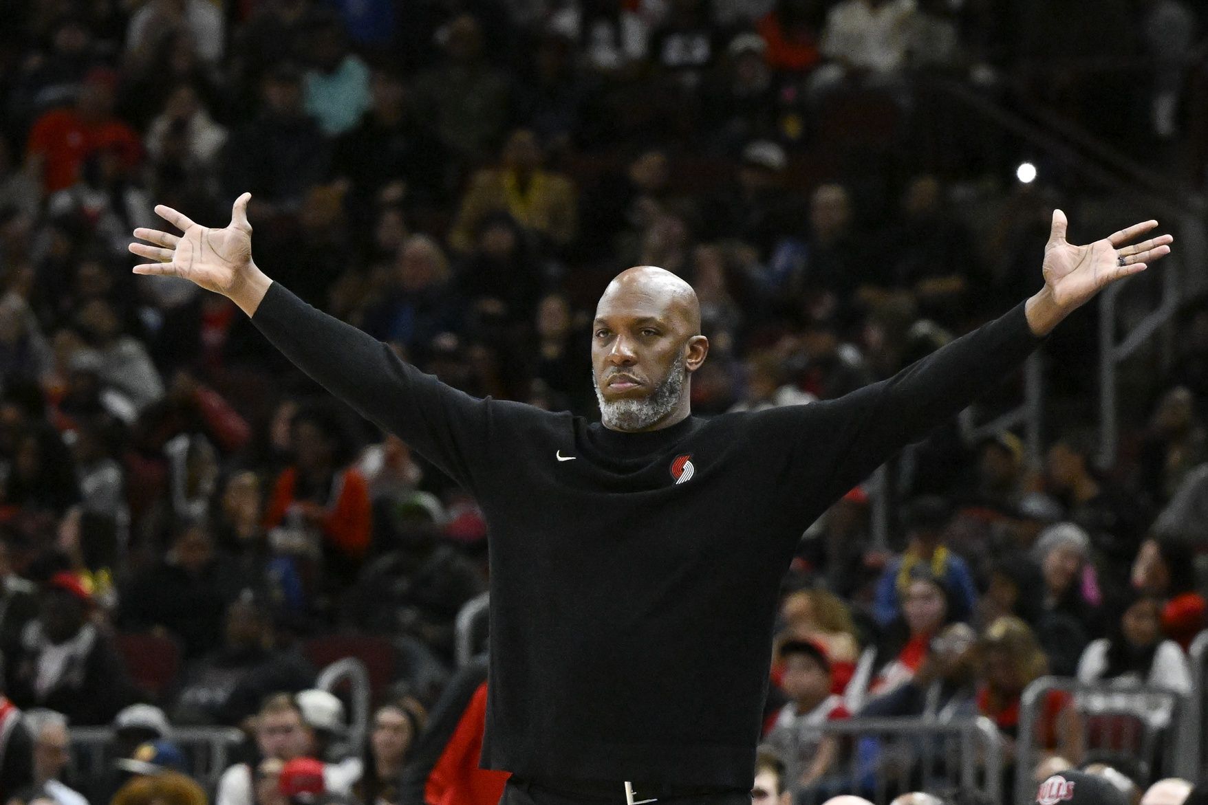 Portland Trail Blazers head coach Chauncey Billups leads his team against the Chicago Bulls during the second half at the United Center.