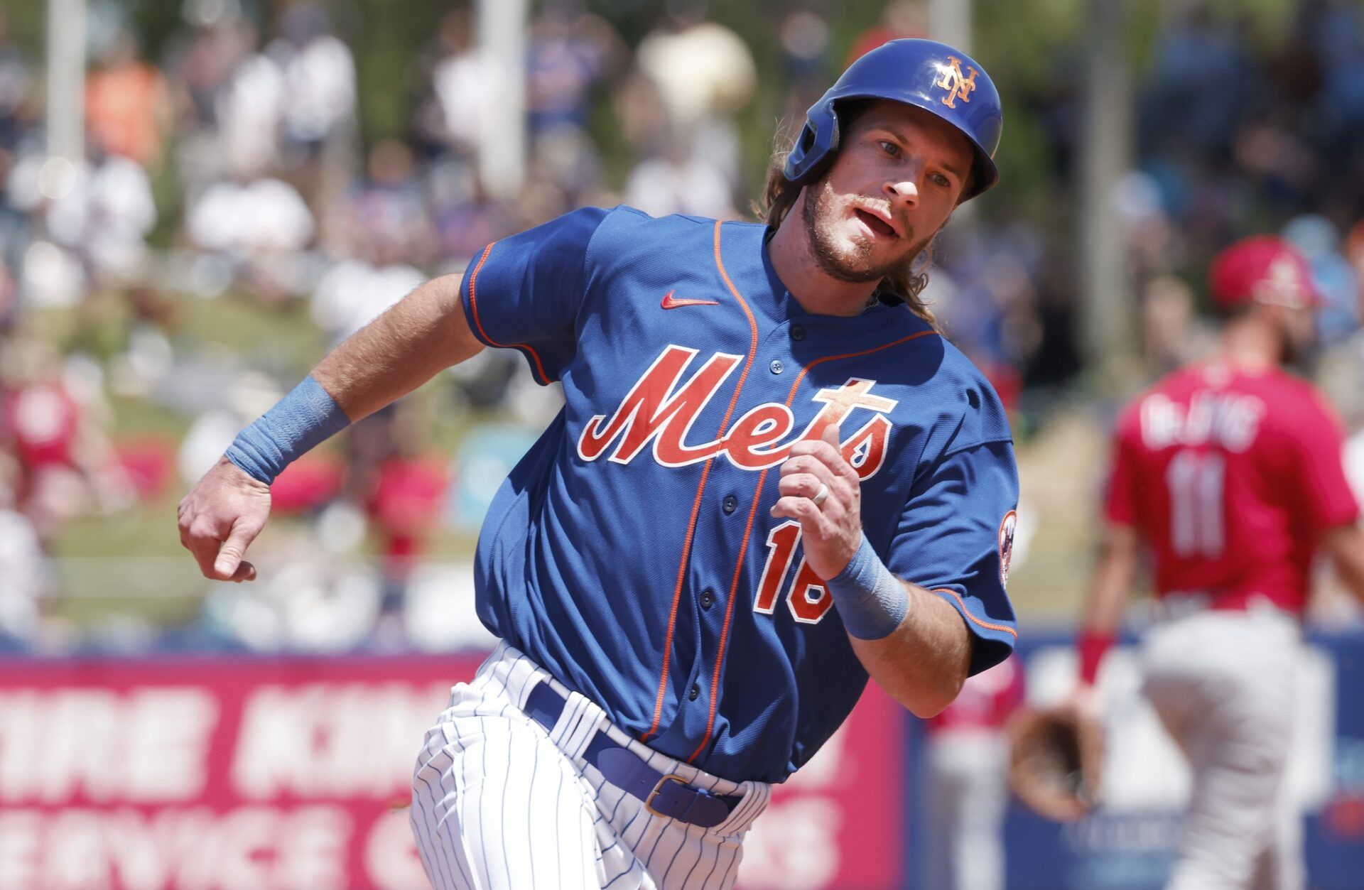 New York Mets center fielder Travis Jankowski rounds second base during the second  inning of a spring training game against the St. Louis Cardinals at Clover Park.