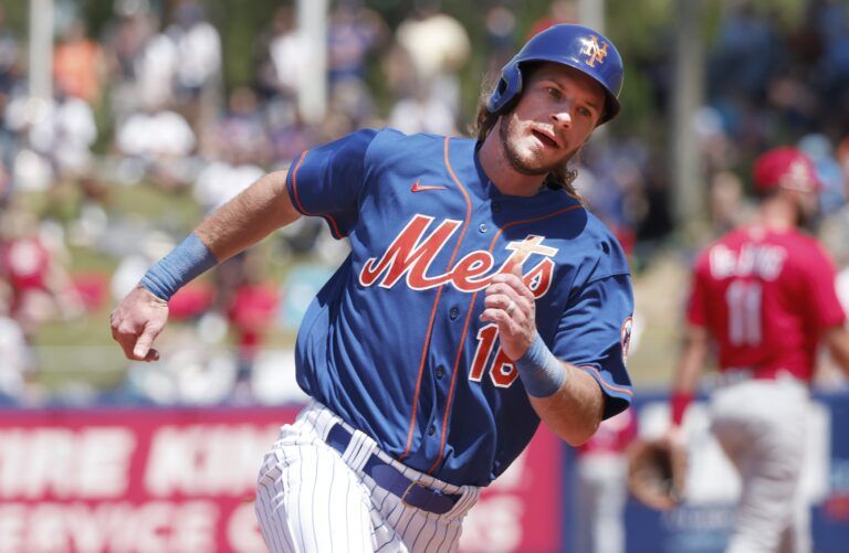 New York Mets center fielder Travis Jankowski rounds second base during the second  inning of a spring training game against the St. Louis Cardinals at Clover Park.