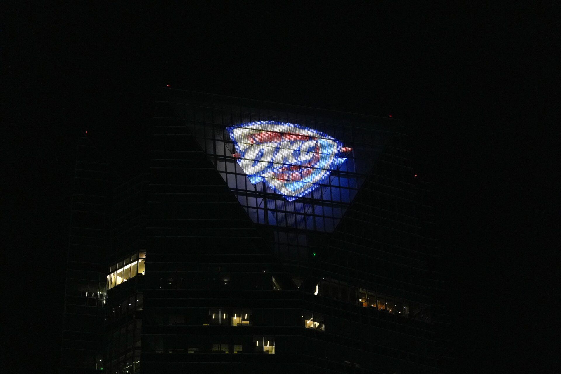 Devon Tower displays a Thunder logo in in Oklahoma City after game 6 of the NBA Finals, on Thursday, June 19, 2025.