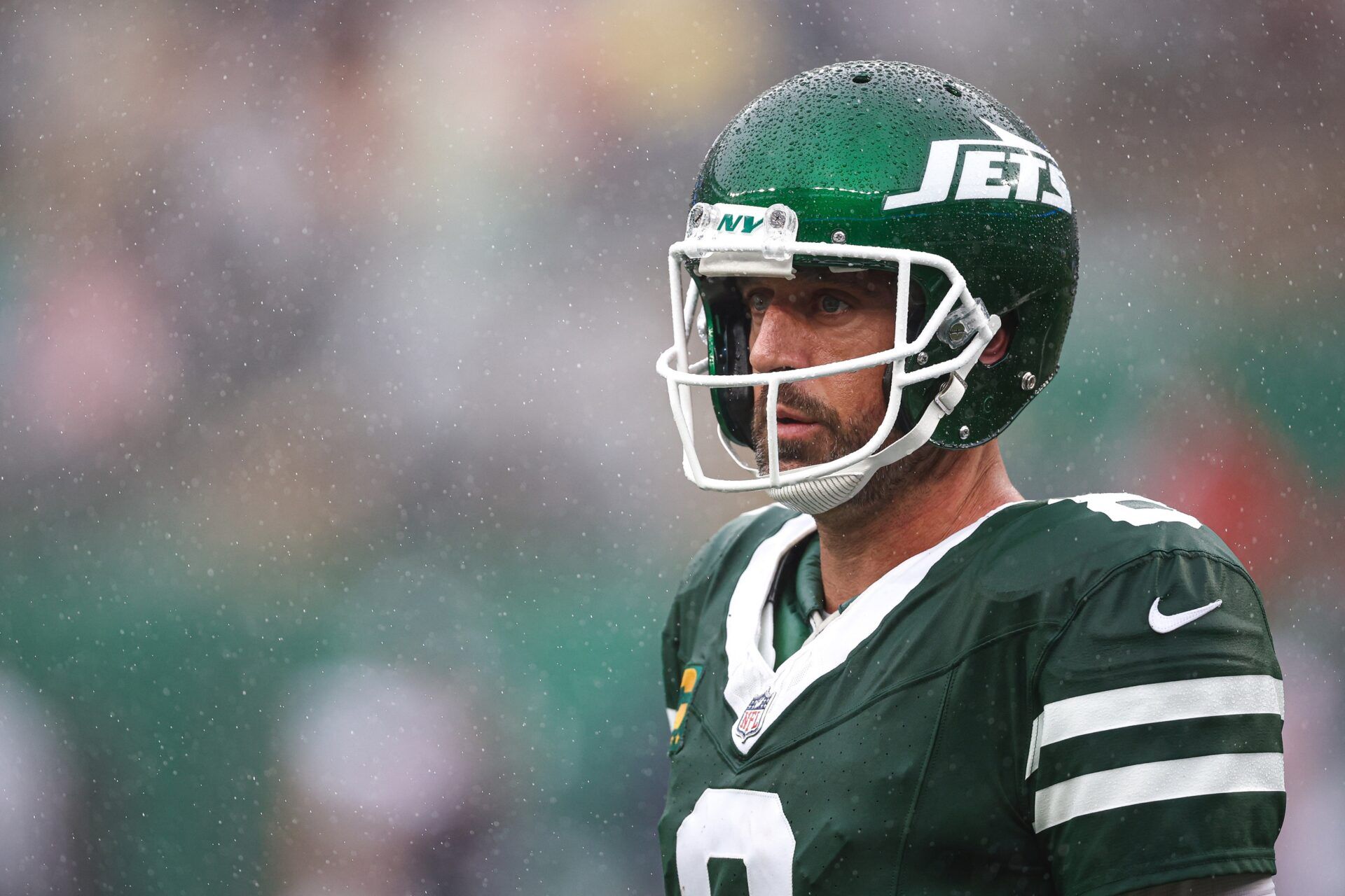 New York Jets quarterback Aaron Rodgers (8) looks on during the first half against the Denver Broncos at MetLife Stadium.