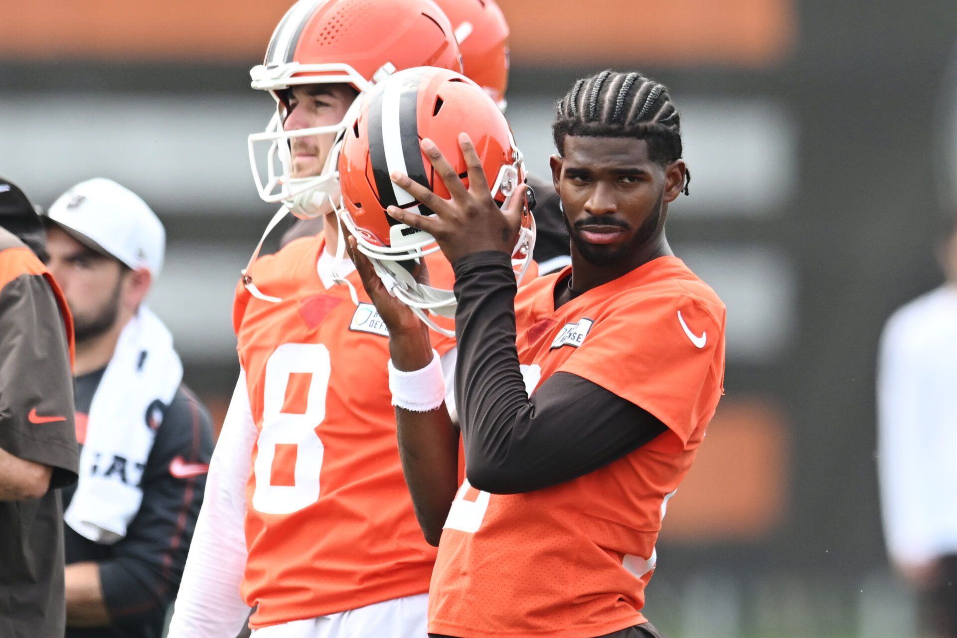 Cleveland Browns quarterback Shedeur Sanders (12) listens to a play call during mini camp at CrossCountry Mortgage Campus.