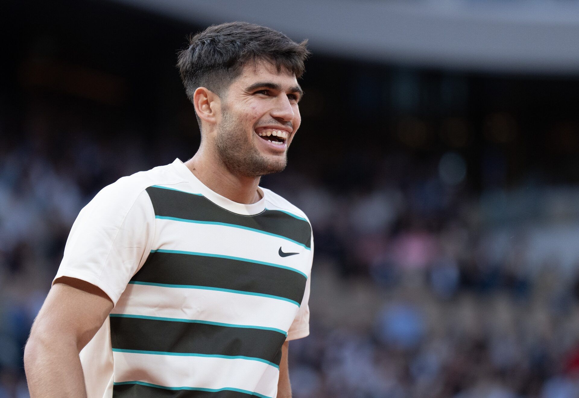 Carlos Alcaraz of Spain reacts to a point during his match  against Tommy Paul of the United States on day 10 at Roland Garros Stadium.