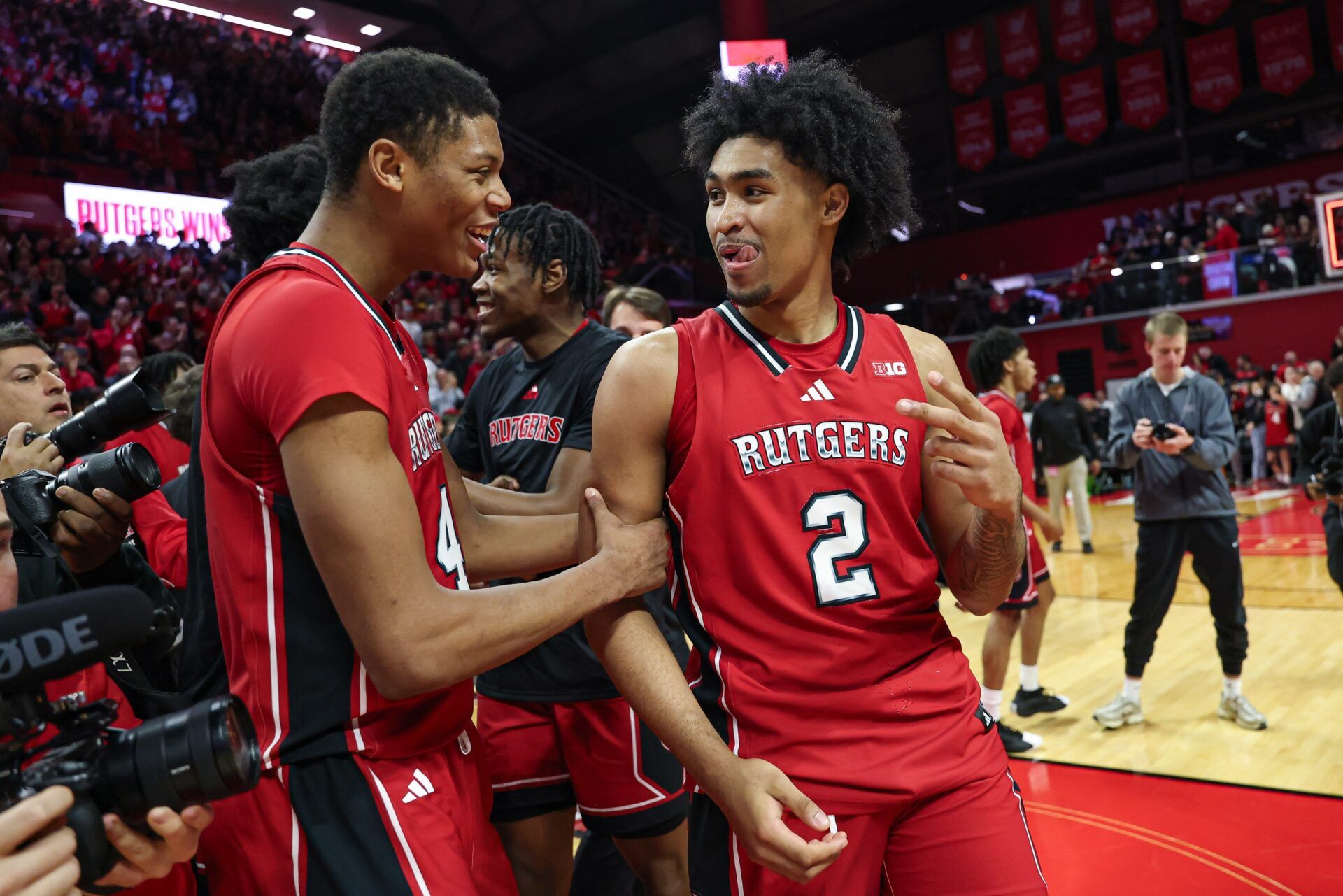 Rutgers Scarlet Knights guard Dylan Harper (2) and guard Ace Bailey (4) celebrate after defeating the Seton Hall Pirates at Jersey Mike's Arena.