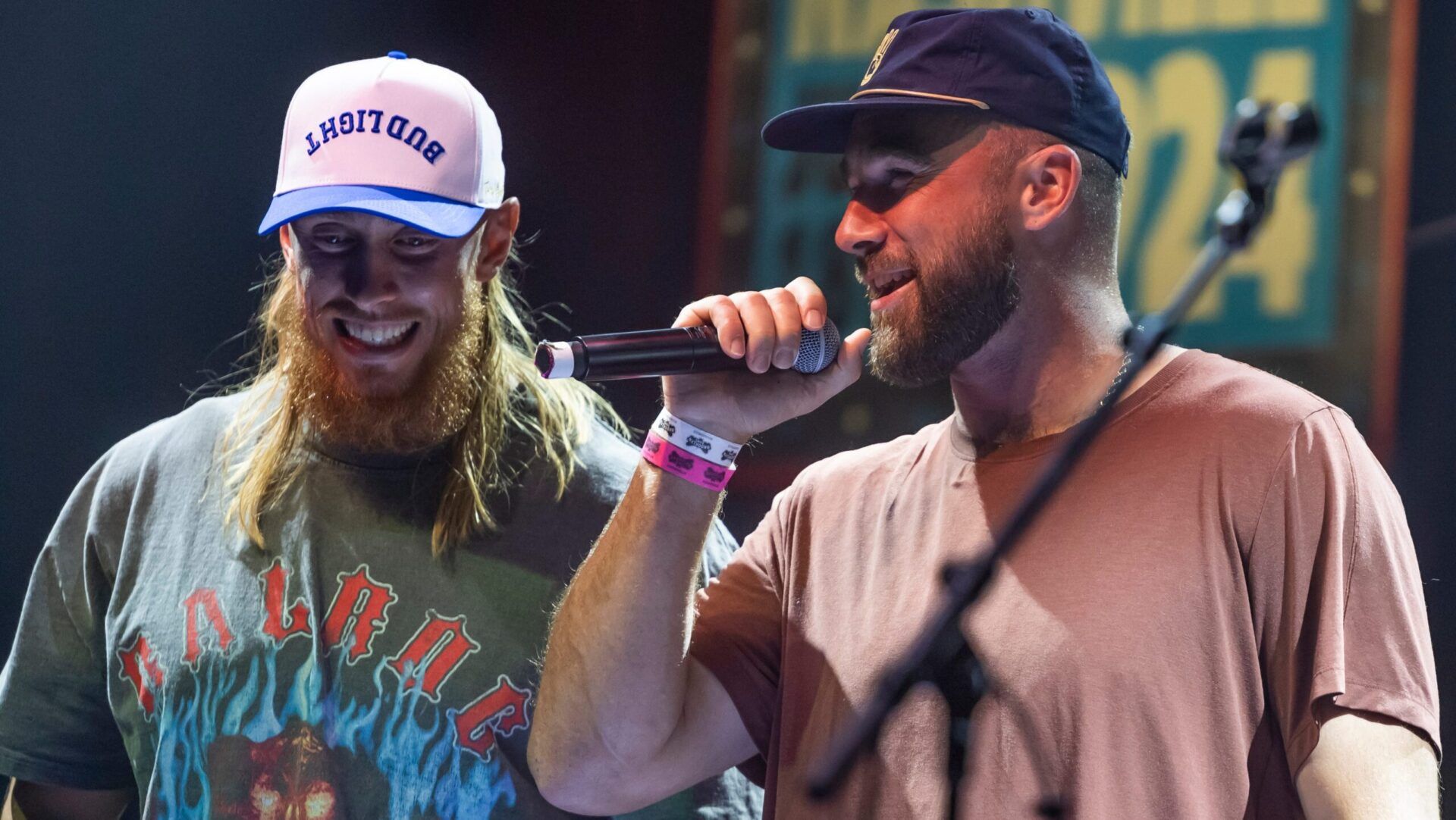 George Kittle and Travis Kelce greet the crowd during the “Tight Ends & Friends” concert at Brooklyn Bowl Tuesday, June 18, 2024 in Nashville, Tenn.