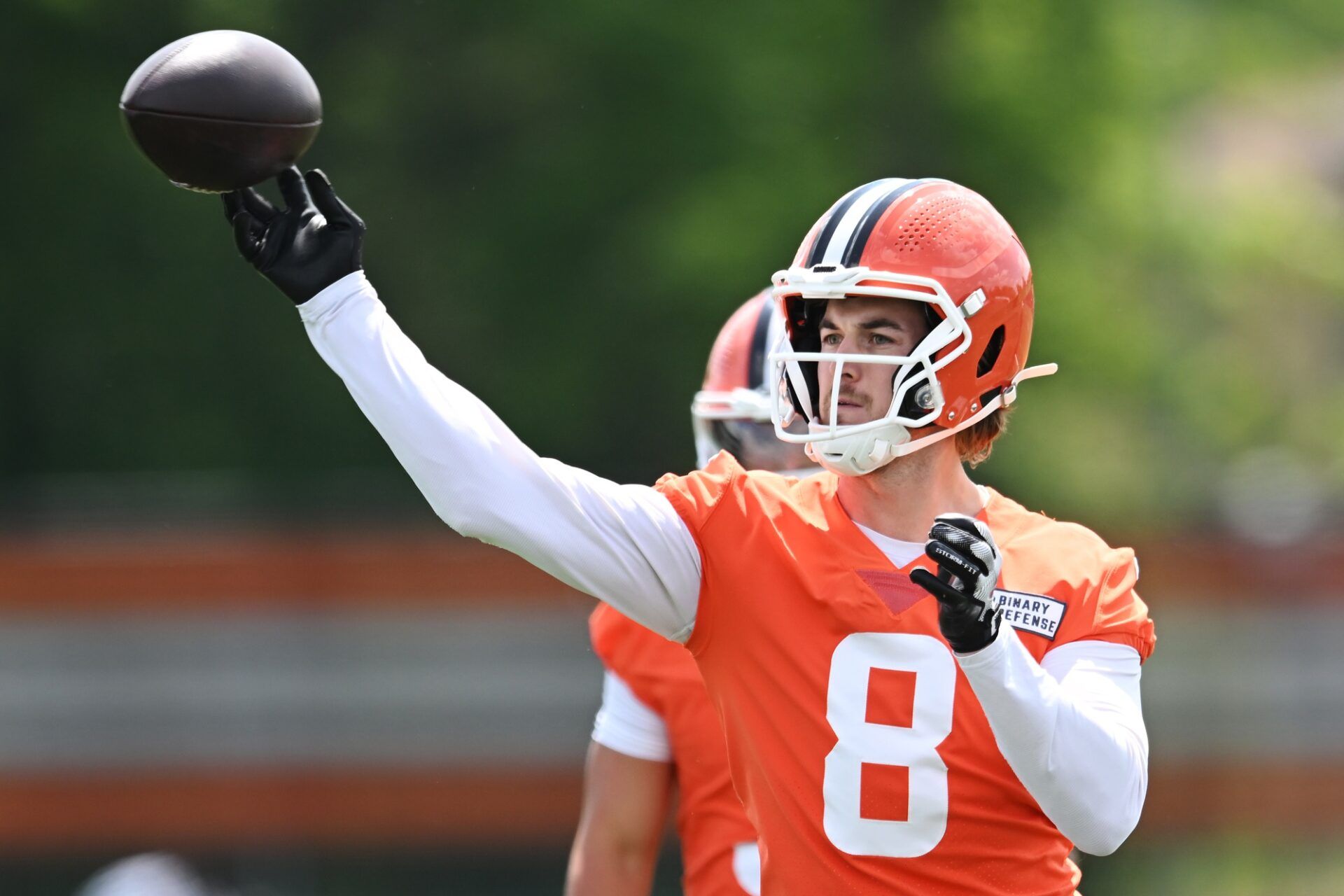 Cleveland Browns quarterback Kenny Pickett (8) throws a pass during minicamp at CrossCountry Mortgage Campus.