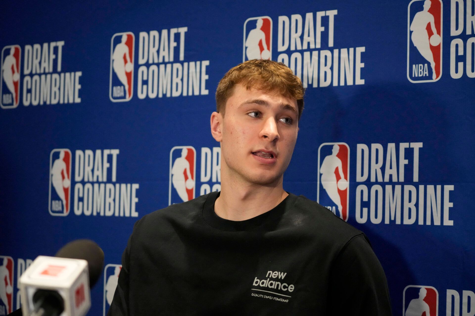 Cooper Flagg talks to the media during the 2025 NBA Draft Combine at Marriott Marquis Chicago.