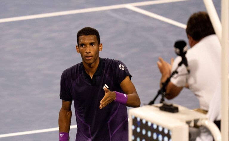 Jack Draper, of the United Kingdom, and Felix Auger Aliassime, of Canada, speak to the chair umpire about Draper’s match winning point during the Cincinnati Open at the Lindner Family Tennis Center in Mason on Friday, Aug. 16, 2024.
