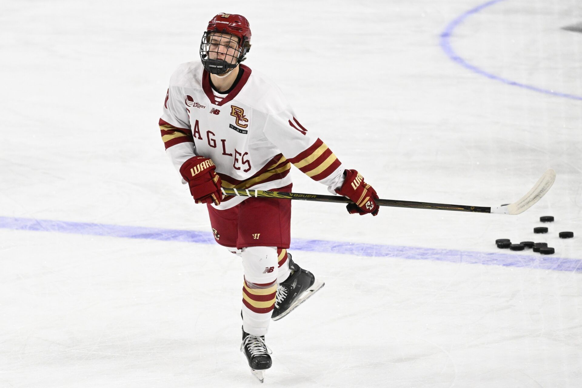 Boston College forward James Hagens (10) warms up before a game against the University of New Hampshire Wildcats at Conte Forum.