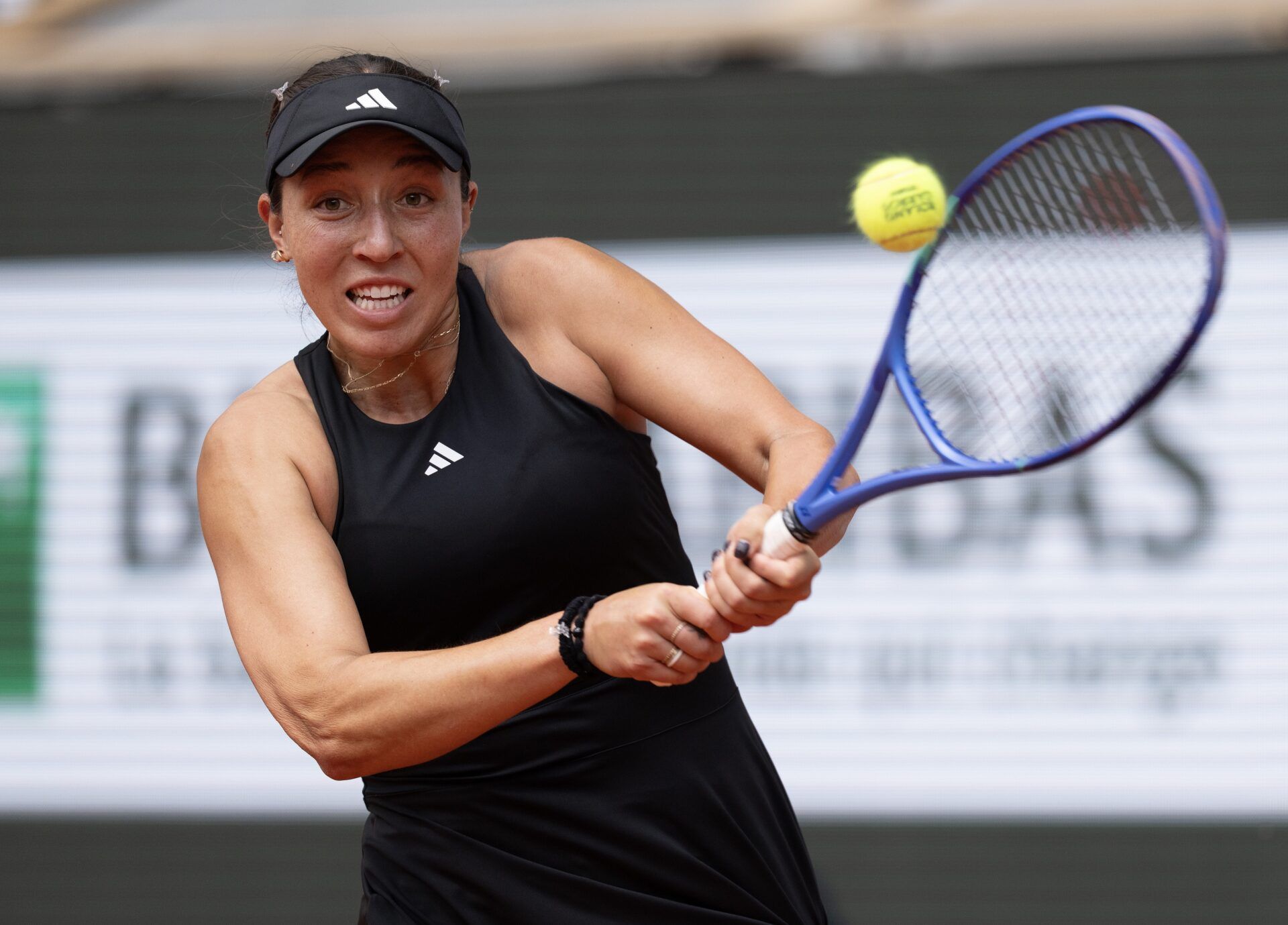 Jessica Pegula of the United States returns a shot during her match against Lois Boisson of France on day nine at Roland Garros Stadium.