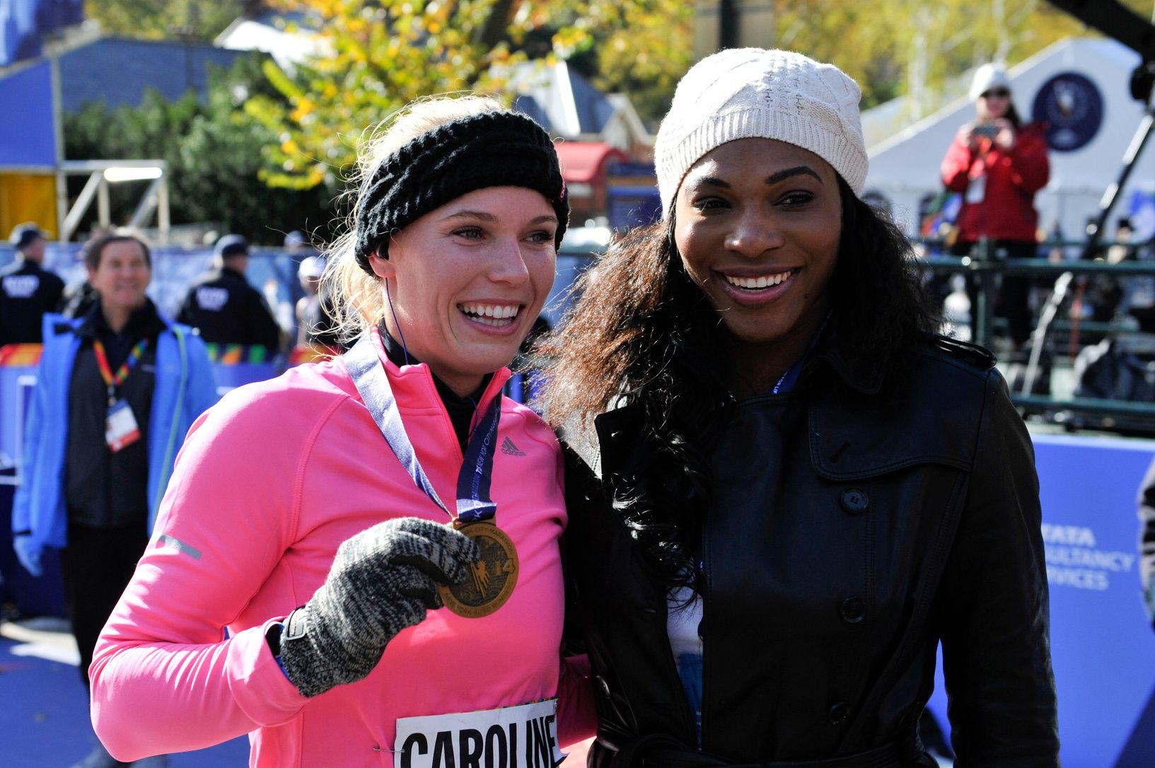 Tennis star Caroline Wozniacki celebrates with close friend, tennis star Serena Williams after she finished the 2014 TCS New York City Marathon.