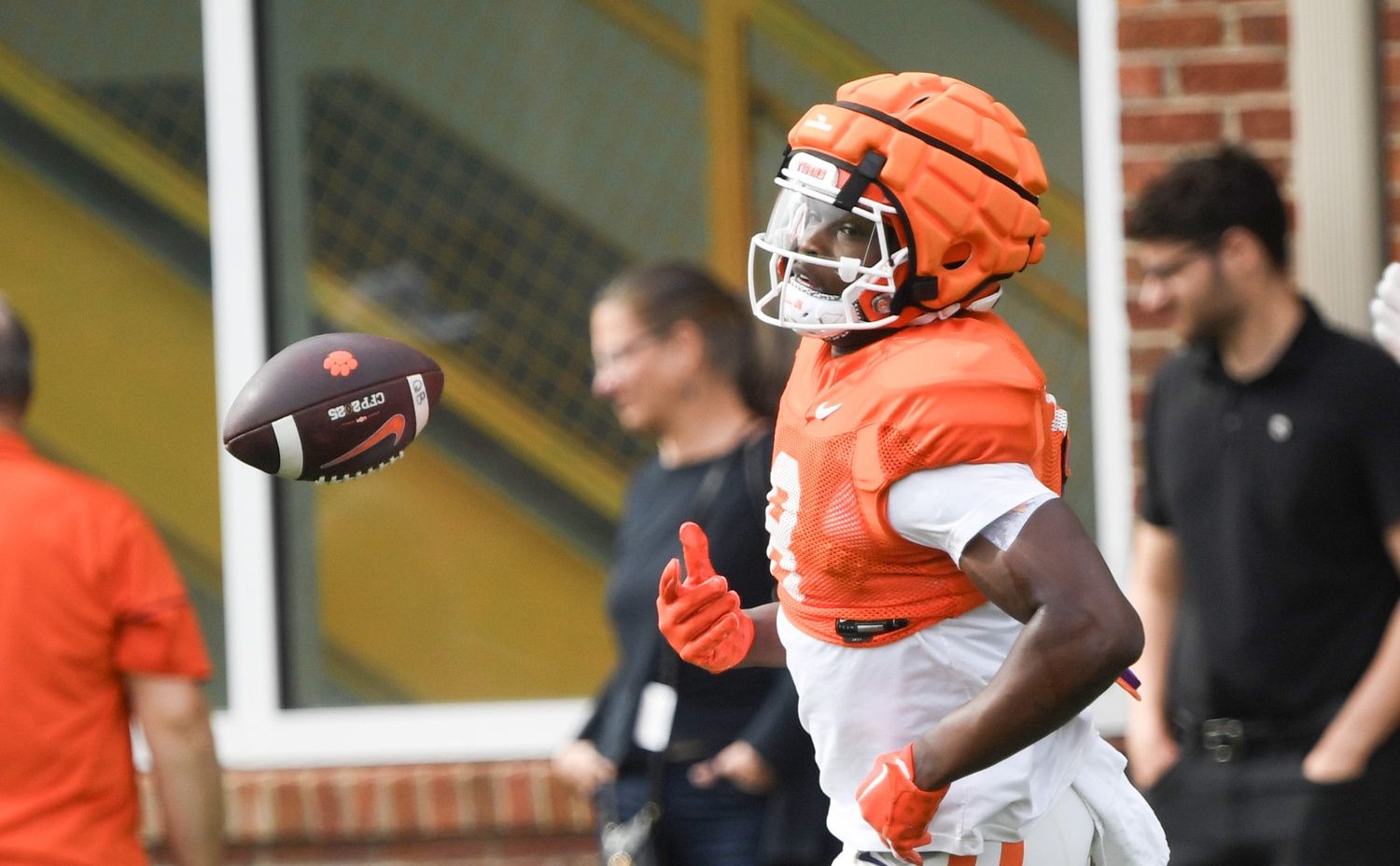 Clemson running back Gideon Davidson (9) flips the ball after a running drill during Spring Practice in Clemson, S.C. Monday, March 24, 2025.
