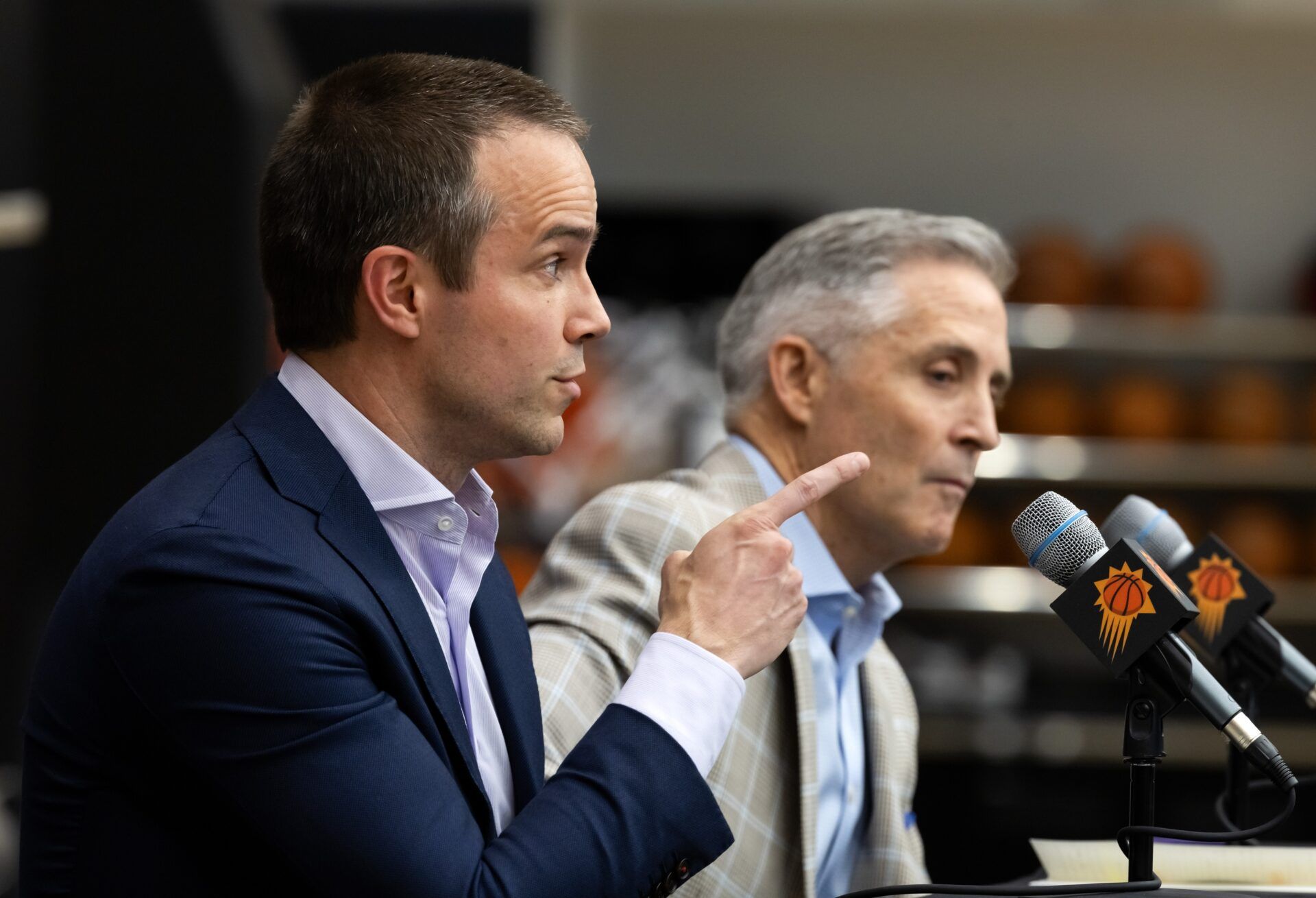 Phoenix Suns head coach Jordan Ott reacts as he speaks alongside general manager Brian Gregory during an introductory press conference at the Verizon 5g Performance Center.
