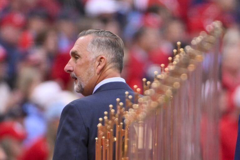 St. Louis Cardinals president of baseball operations John Mozeliak looks on during opening day ceremonies before the game between the Cardinals and the Minnesota Twins at Busch Stadium.