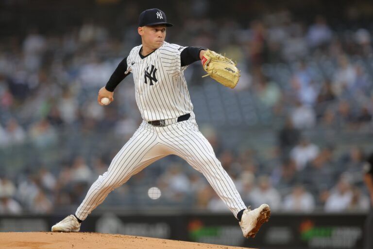 New York Yankees starting pitcher Will Warren (98) pitches against the Los Angeles Angels during the first inning at Yankee Stadium.