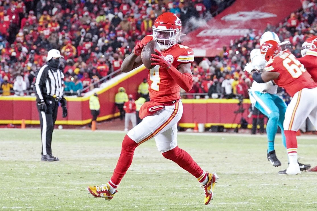 Kansas City Chiefs wide receiver Rashee Rice (4) catches a pass against the Miami Dolphins in a 2024 AFC wild card game at GEHA Field at Arrowhead Stadium.