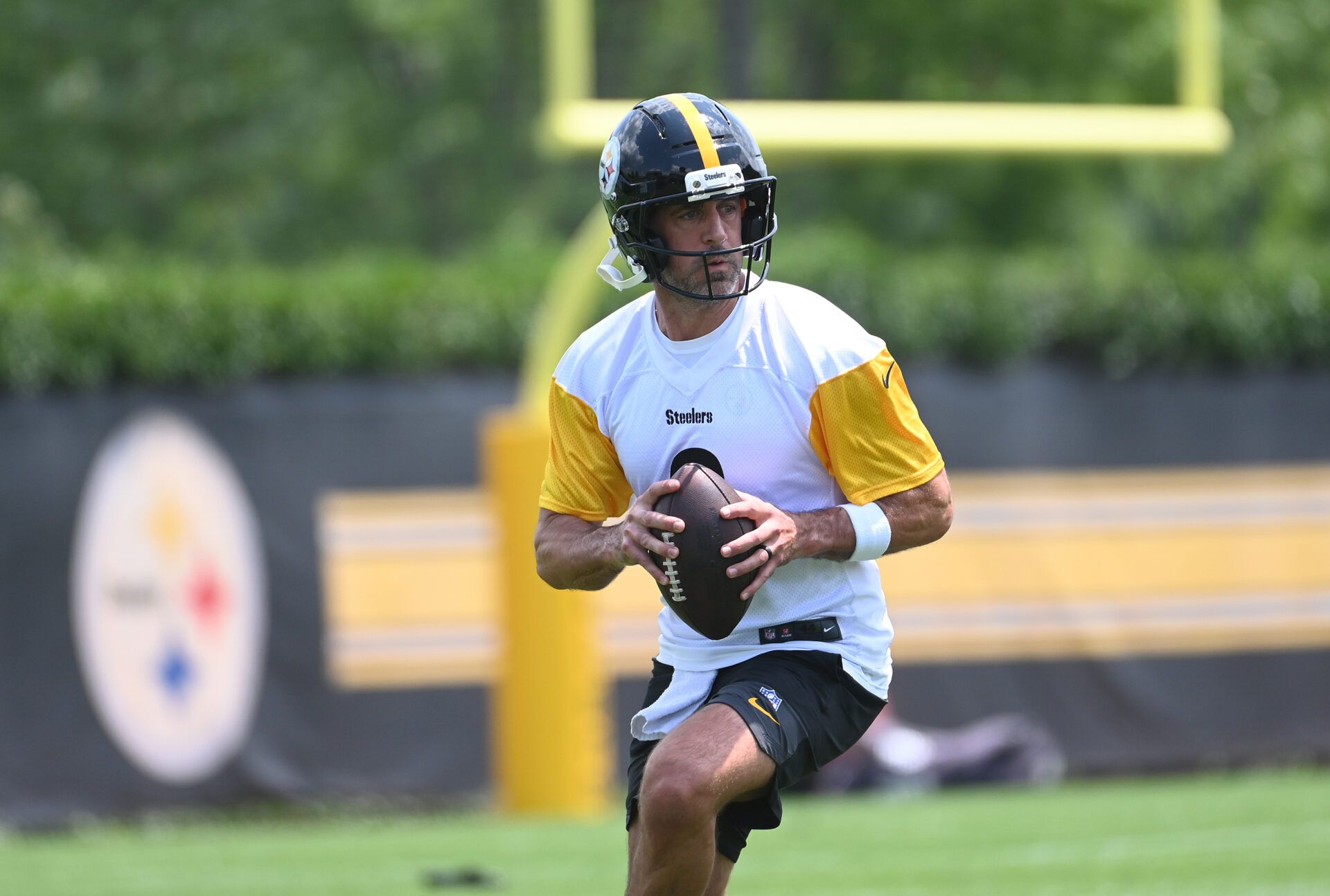 Pittsburgh Steelers quarterback Aaron Rodgers (8) drops back to pass during minicamp at their South Side facility.