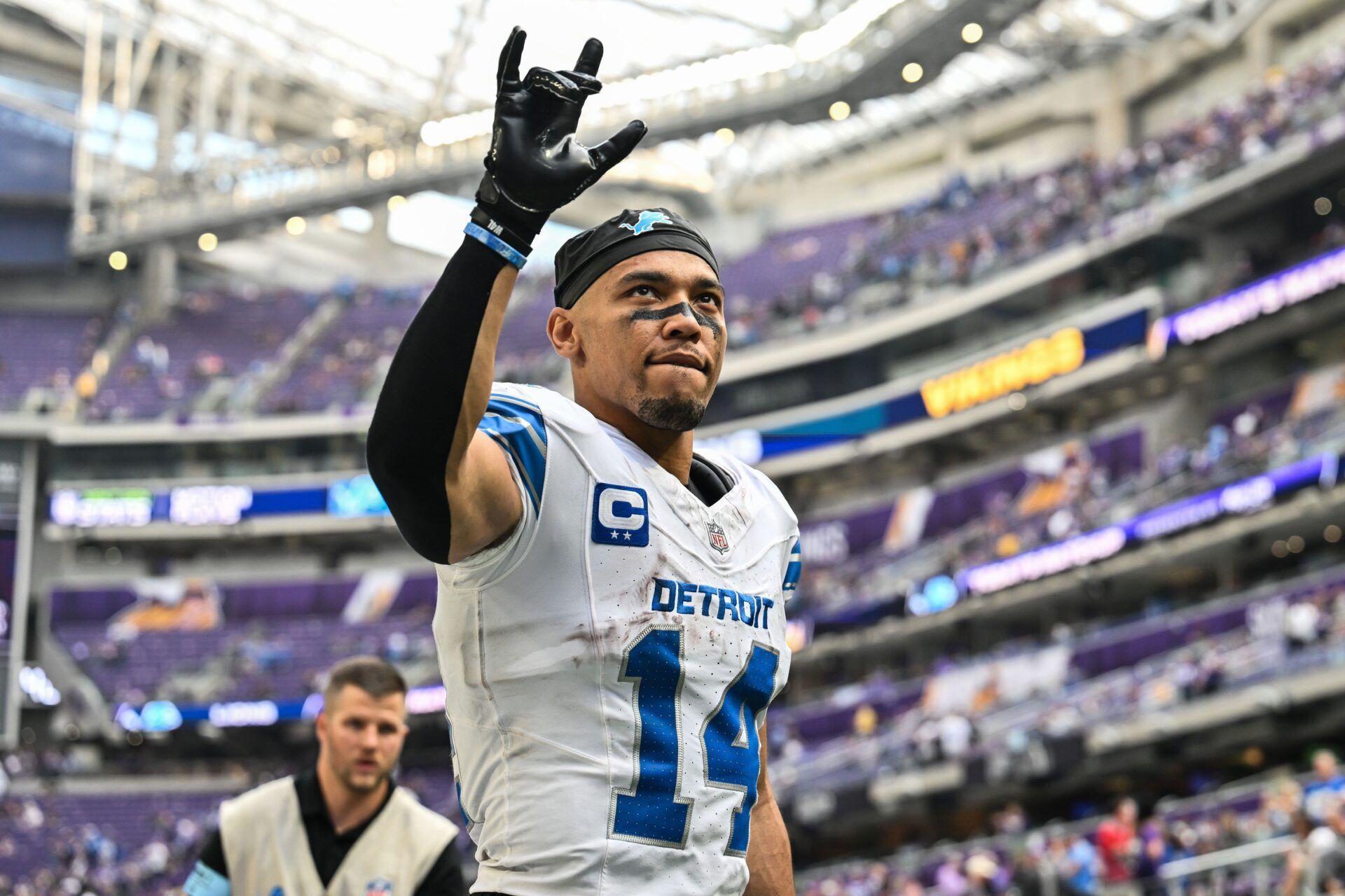 Detroit Lions wide receiver Amon-Ra St. Brown (14) walks off the field after the game against the Minnesota Vikings at U.S. Bank Stadium.