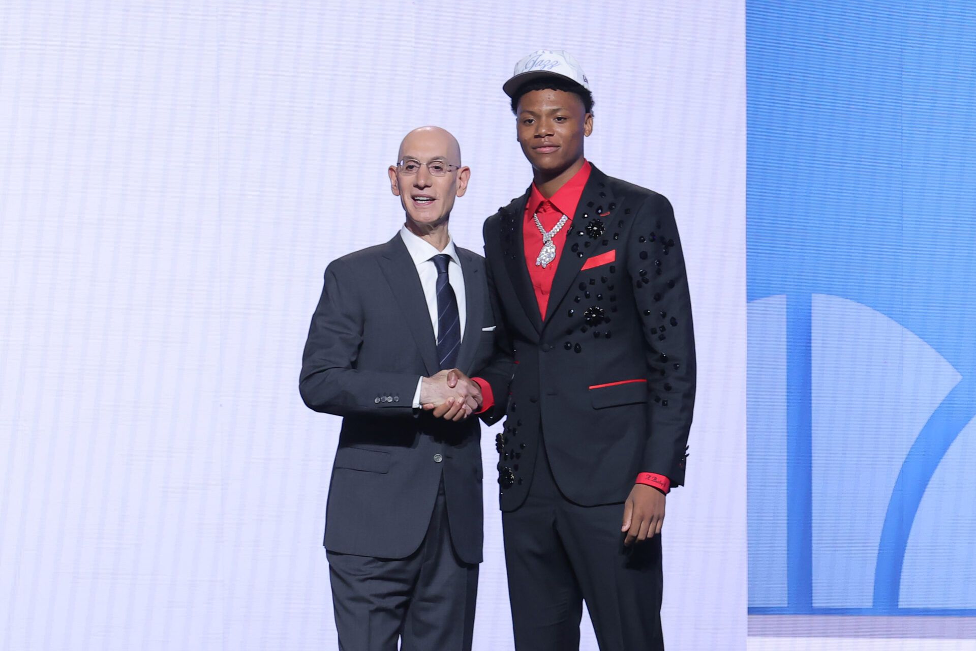 Ace Bailey stands with NBA commissioner Adam Silver after being selected as the fifth pick by the Utah Jazz in the first round of the 2025 NBA Draft at Barclays Center.