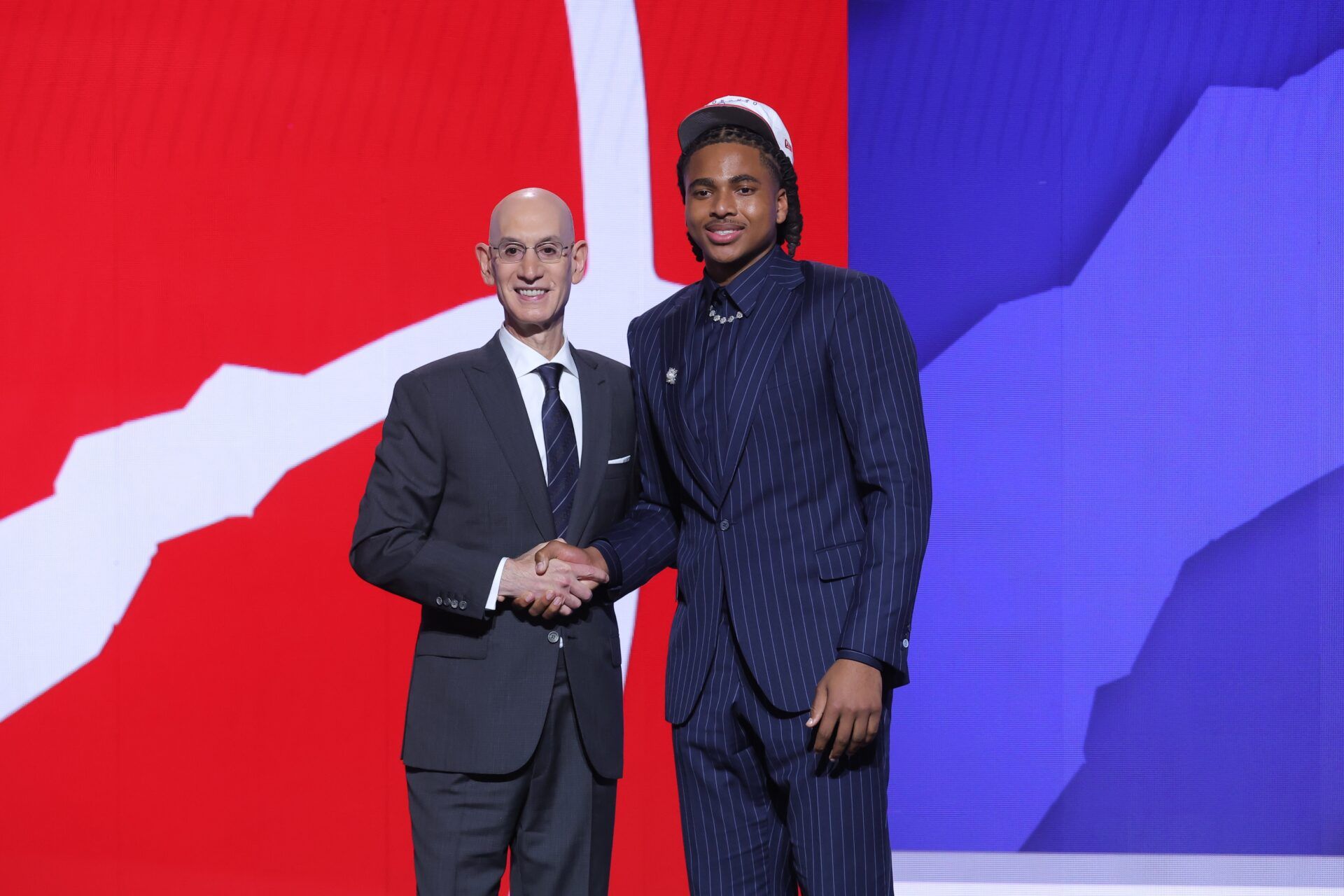 Collin Murray-Boyles stands with NBA commissioner Adam Silver after being selected as the ninth pick by the Toronto Raptors in the first round of the 2025 NBA Draft at Barclays Center.