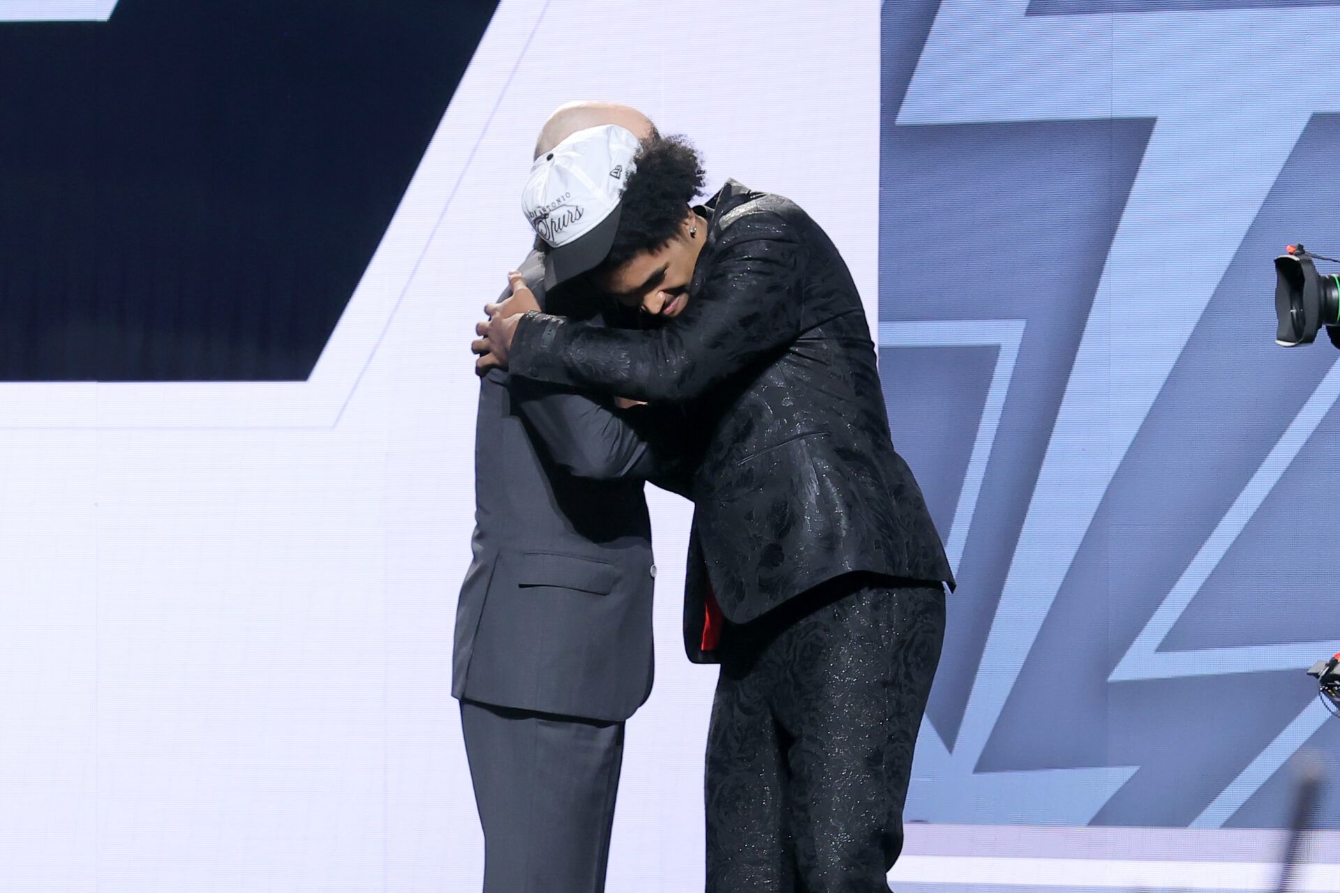 Dylan Harper embraces NBA commissioner Adam Silver after being selected as the second pick by the San Antonio Spurs in the first round of the 2025 NBA Draft at Barclays Center.