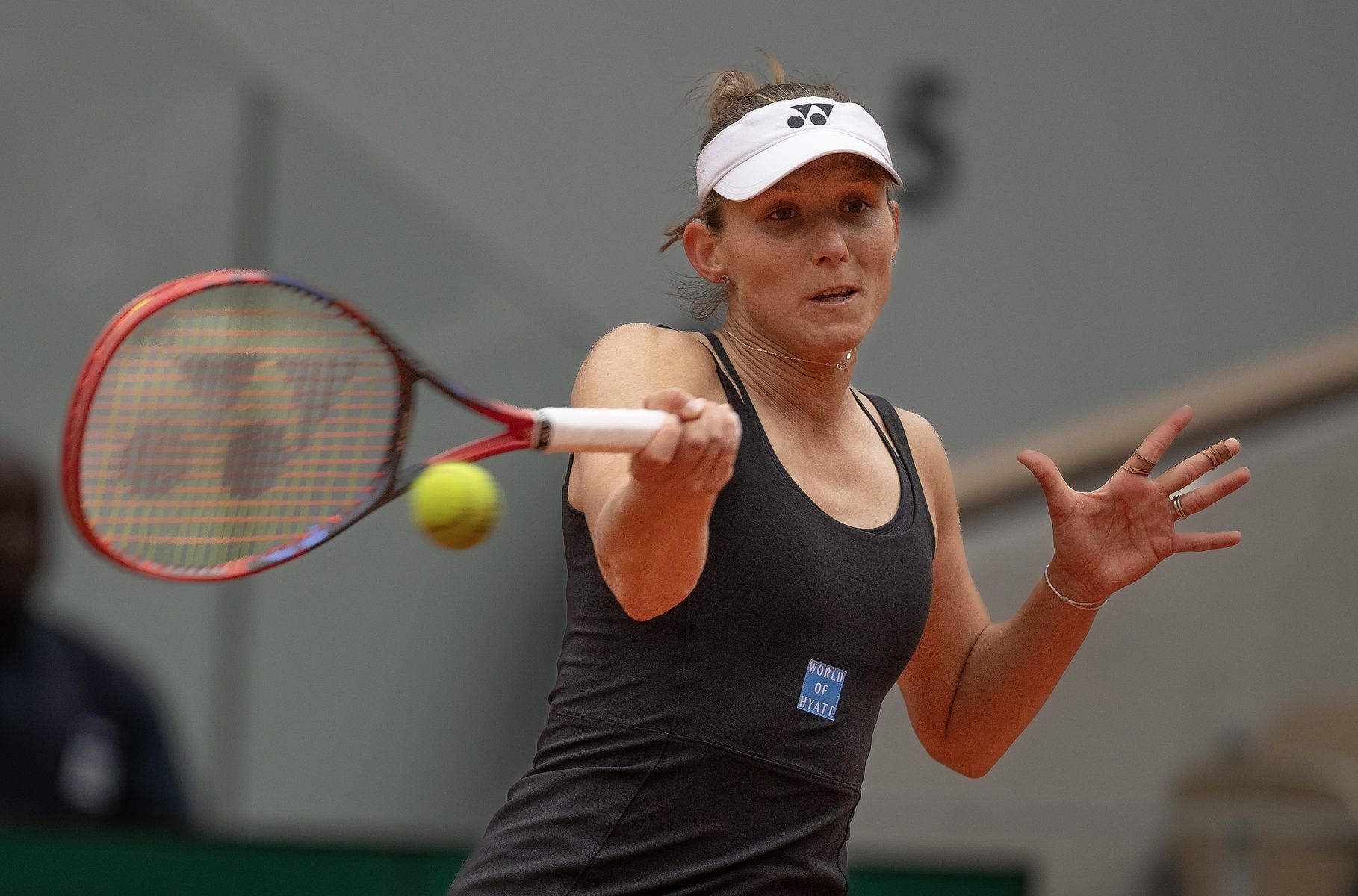 Varvara Gracheva of France returns a shot during her match against Sofia Kenin of the United States on day three at Roland Garros Stadium.