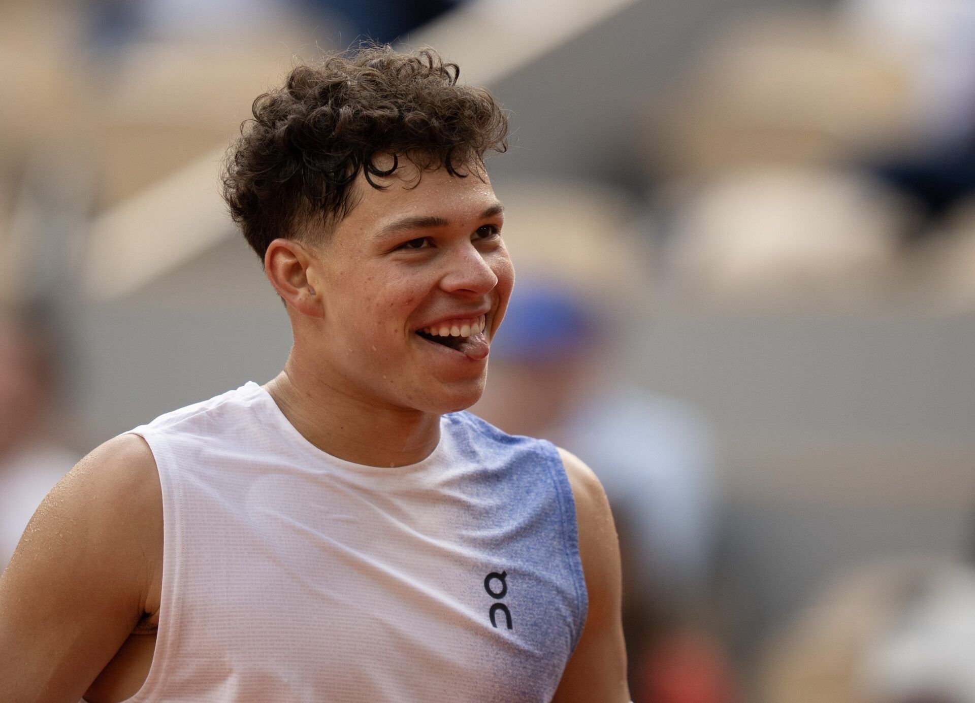 Ben Shelton of the United States reacts to a point during his match against Carlos Alcaraz of Spain on day eight at Roland Garros Stadium.