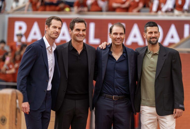 Roger Federer of Switzerland, Novak Djokovic of Serbia and Andy Murray of Great Britain with Rafael Nadal of Spain during the presentation ceremony paying tribute to the career of Rafael Nadal of Spain  on a packed Court Philippe Chatrier Courtday on day one at Roland Garros Stadium.