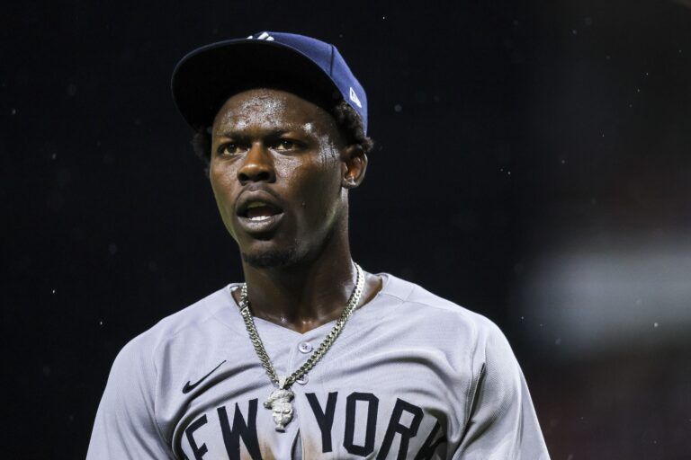 New York Yankees third baseman Jazz Chisholm Jr. (13) walks off the field after being ejected by umpire Mark Wegner (not pictured) in the ninth inning in the game against the Cincinnati Reds at Great American Ball Park.